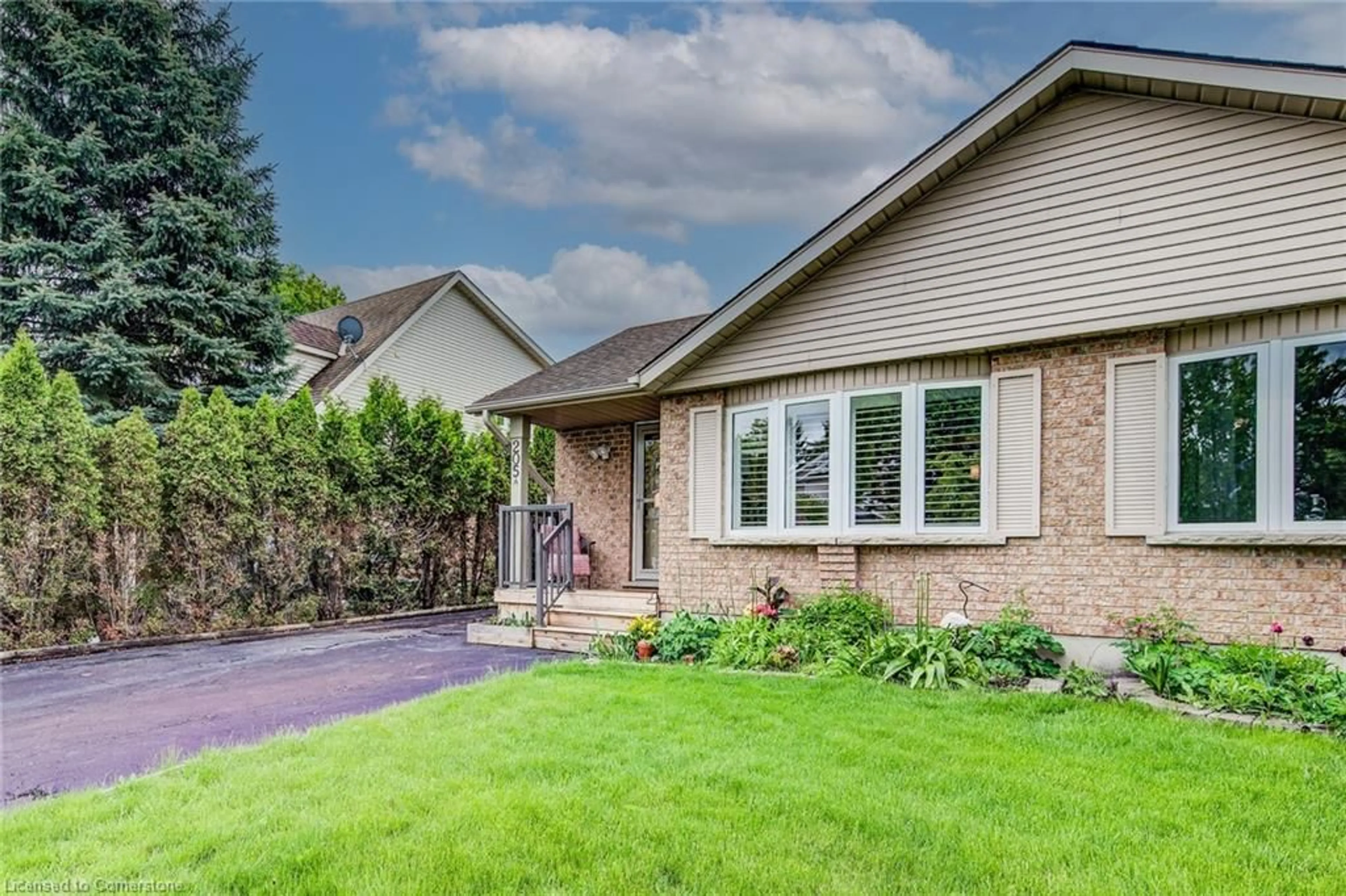 Home with brick exterior material, street for 205 Auburn Dr #A, Waterloo Ontario N2K 3T1