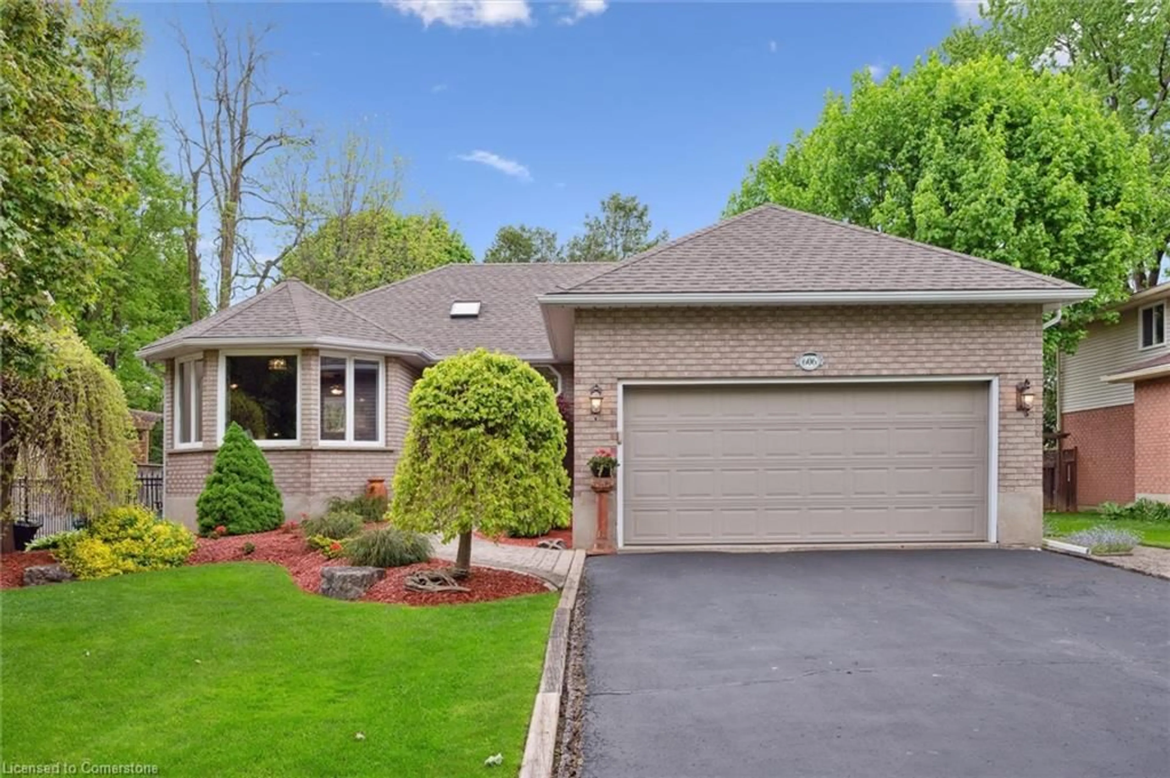 Home with brick exterior material, street for 606 Rustic Dr, Waterloo Ontario N2K 2A8
