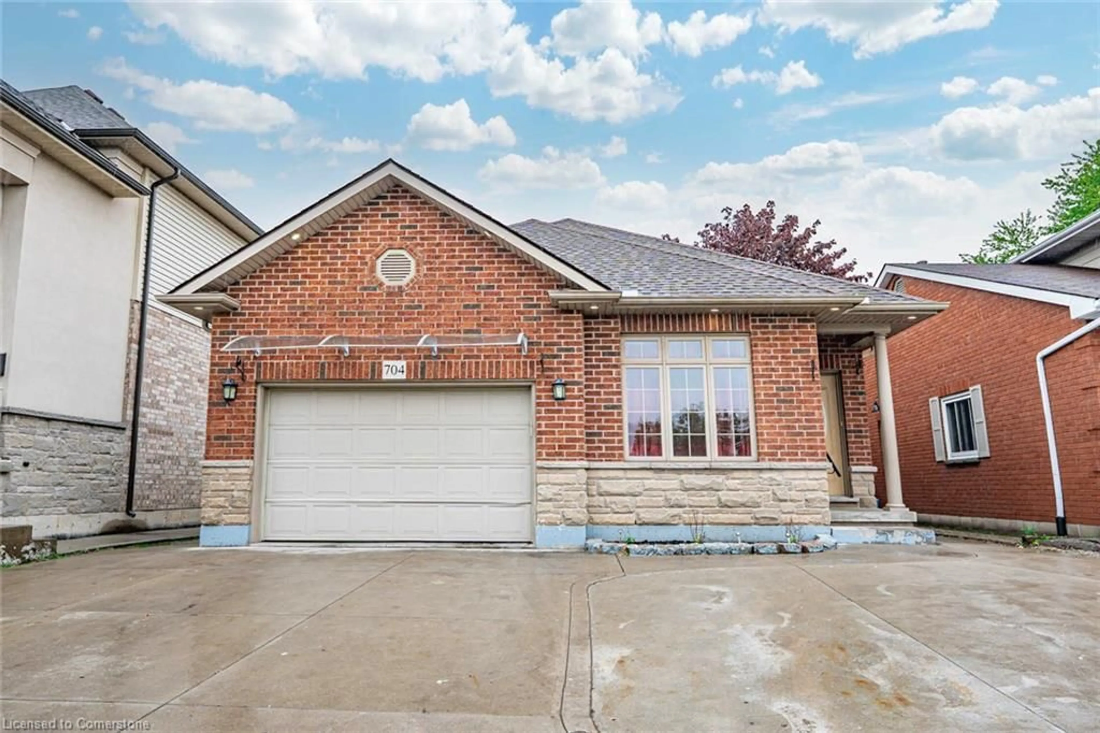 Home with brick exterior material, street for 704 Stone Church Rd, Hamilton Ontario L8W 1A7