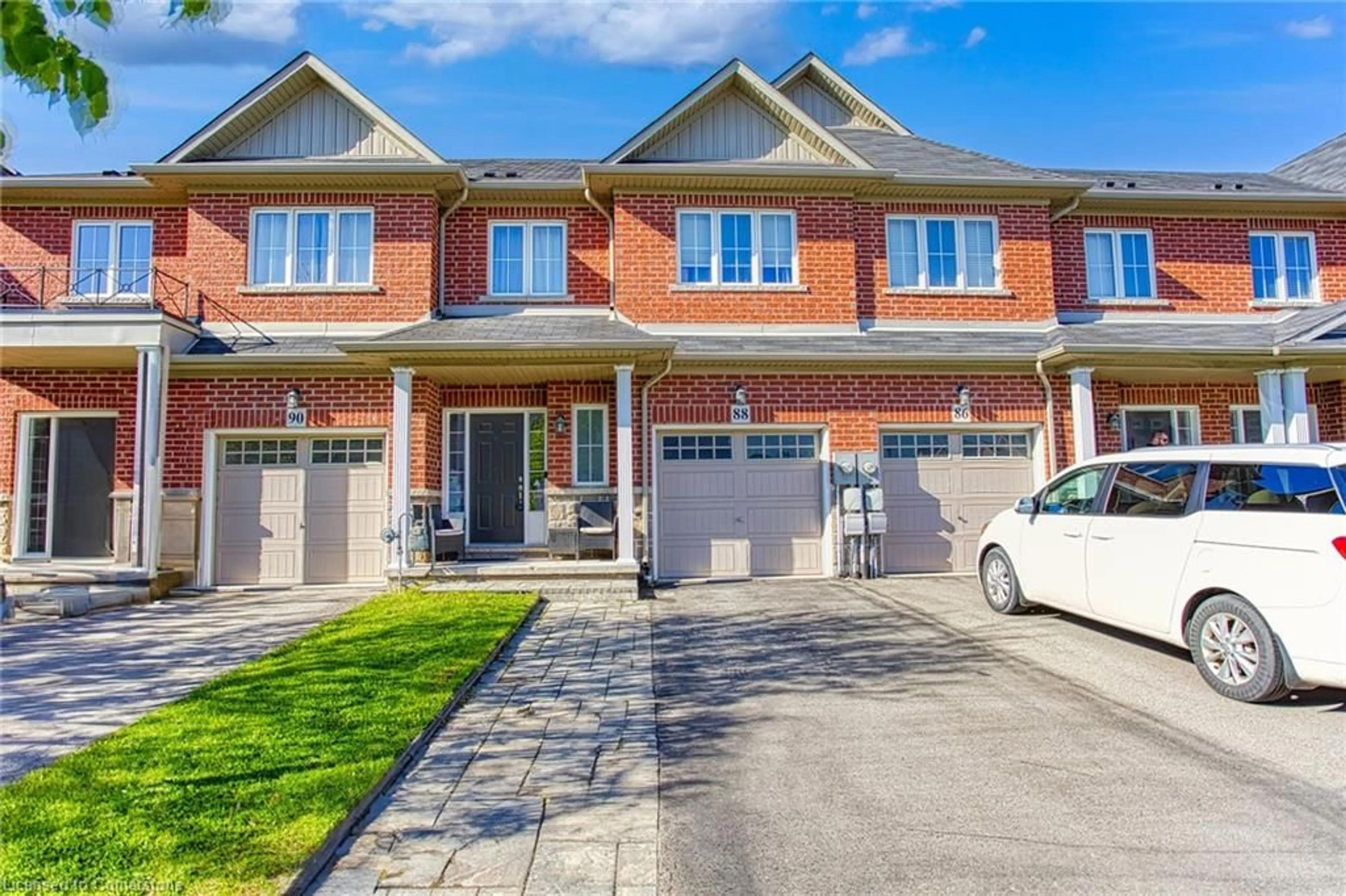 Home with brick exterior material, street for 88 Palacebeach Trail, Stoney Creek Ontario L8E 0B8