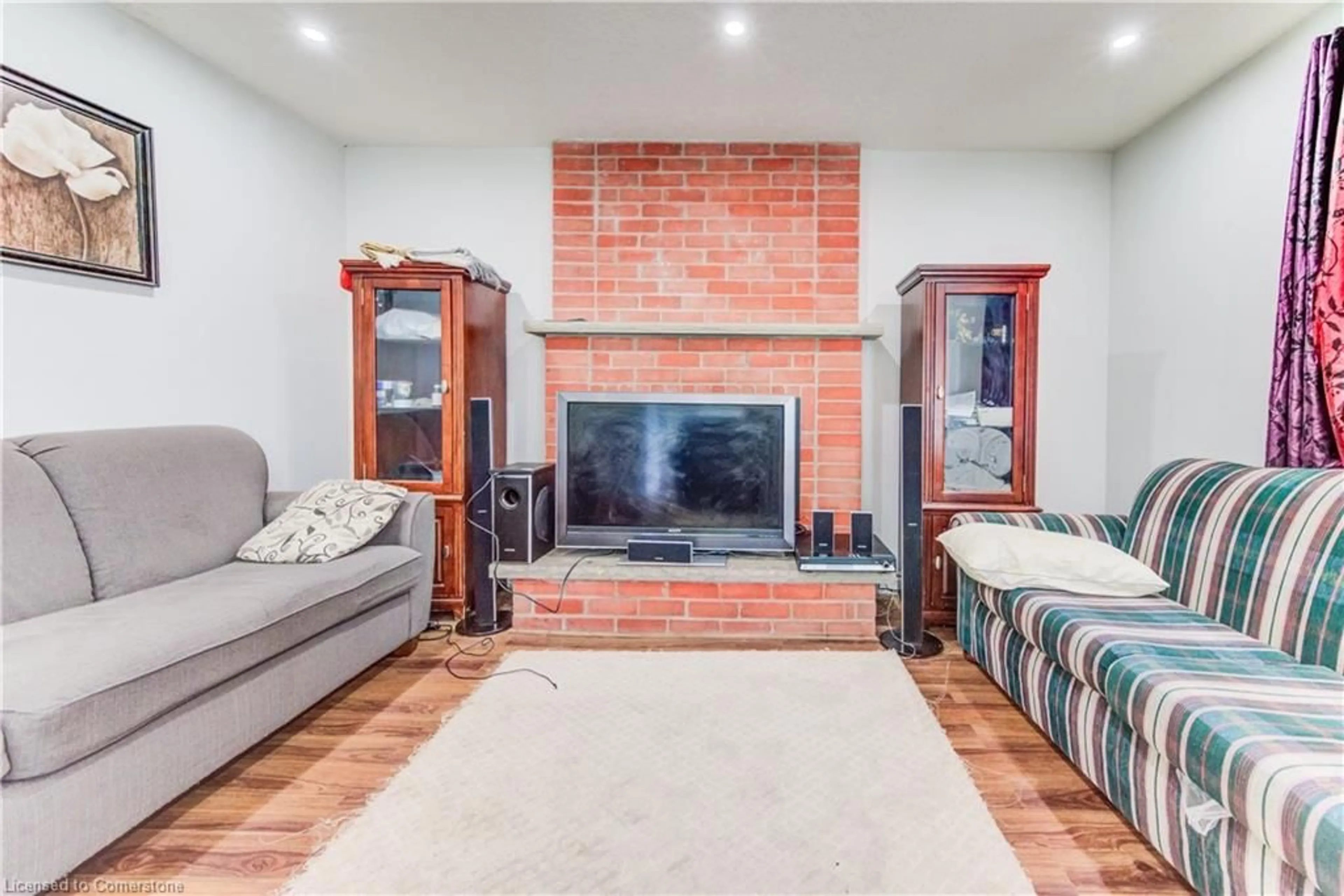 Living room with furniture, ceramic/tile floor for 27 Tassie Lane, Cambridge Ontario N1T 1C7