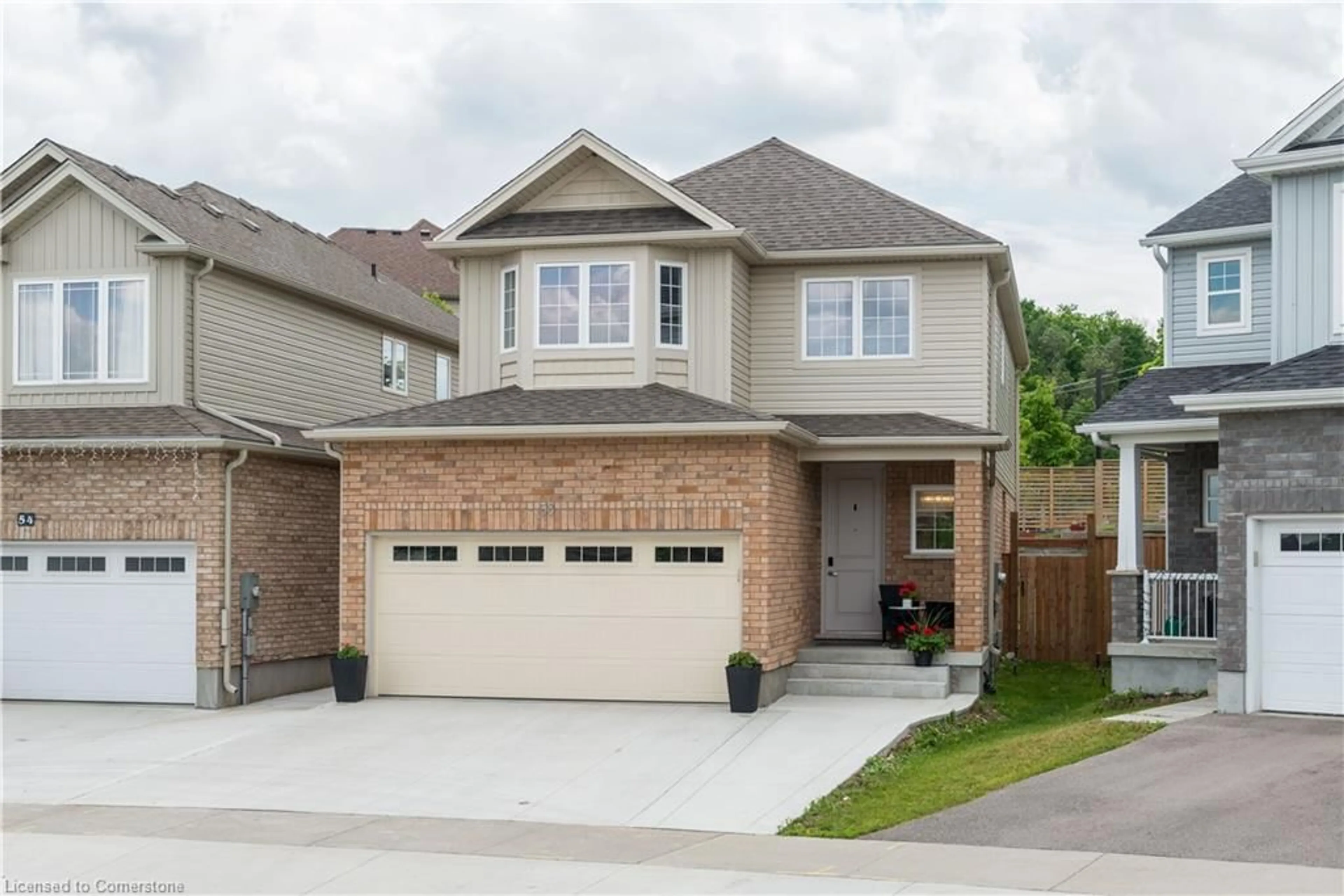 Home with brick exterior material, street for 50 Willowrun Dr, Kitchener Ontario N2A 0H5