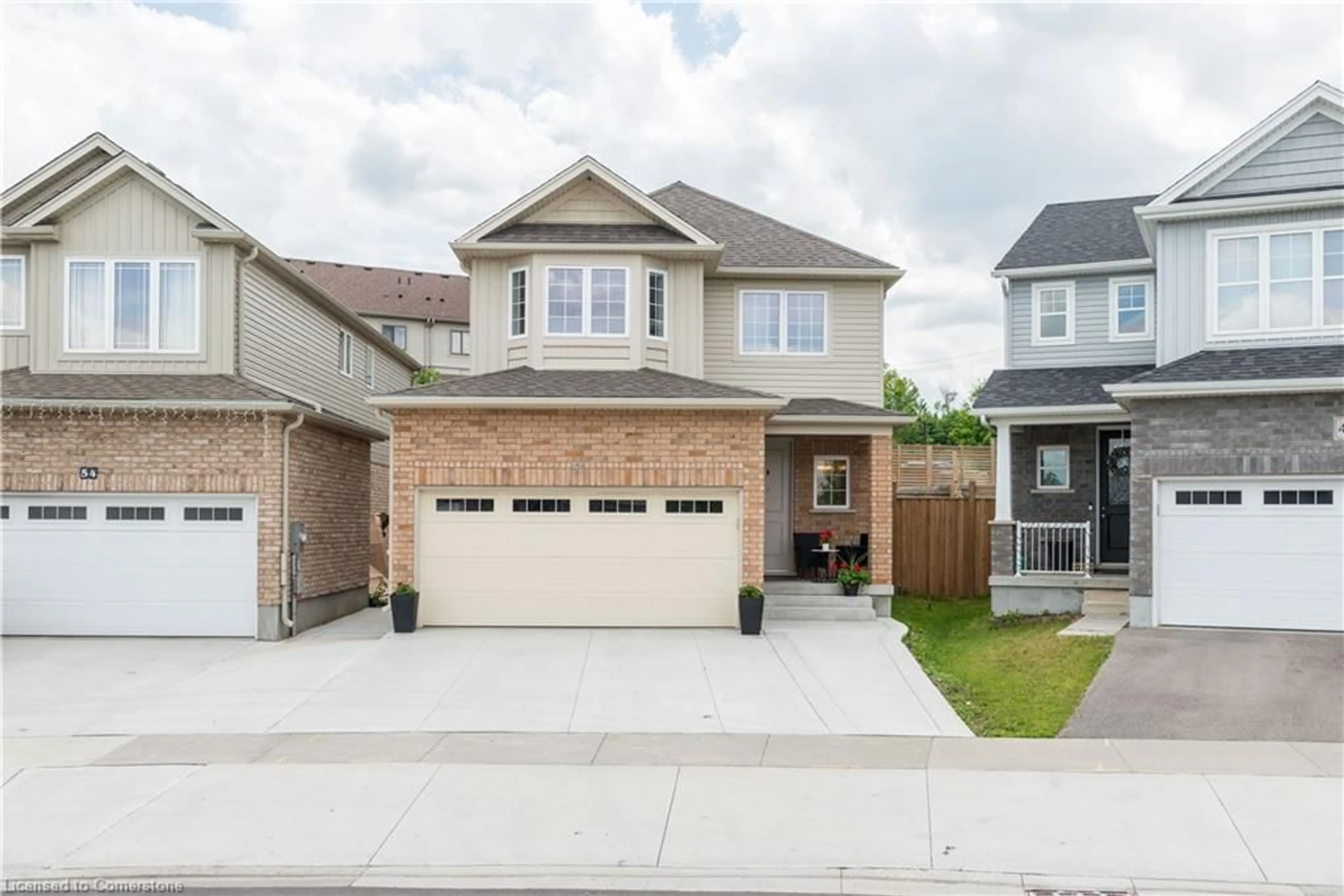 Home with brick exterior material, street for 50 Willowrun Dr, Kitchener Ontario N2A 0H5