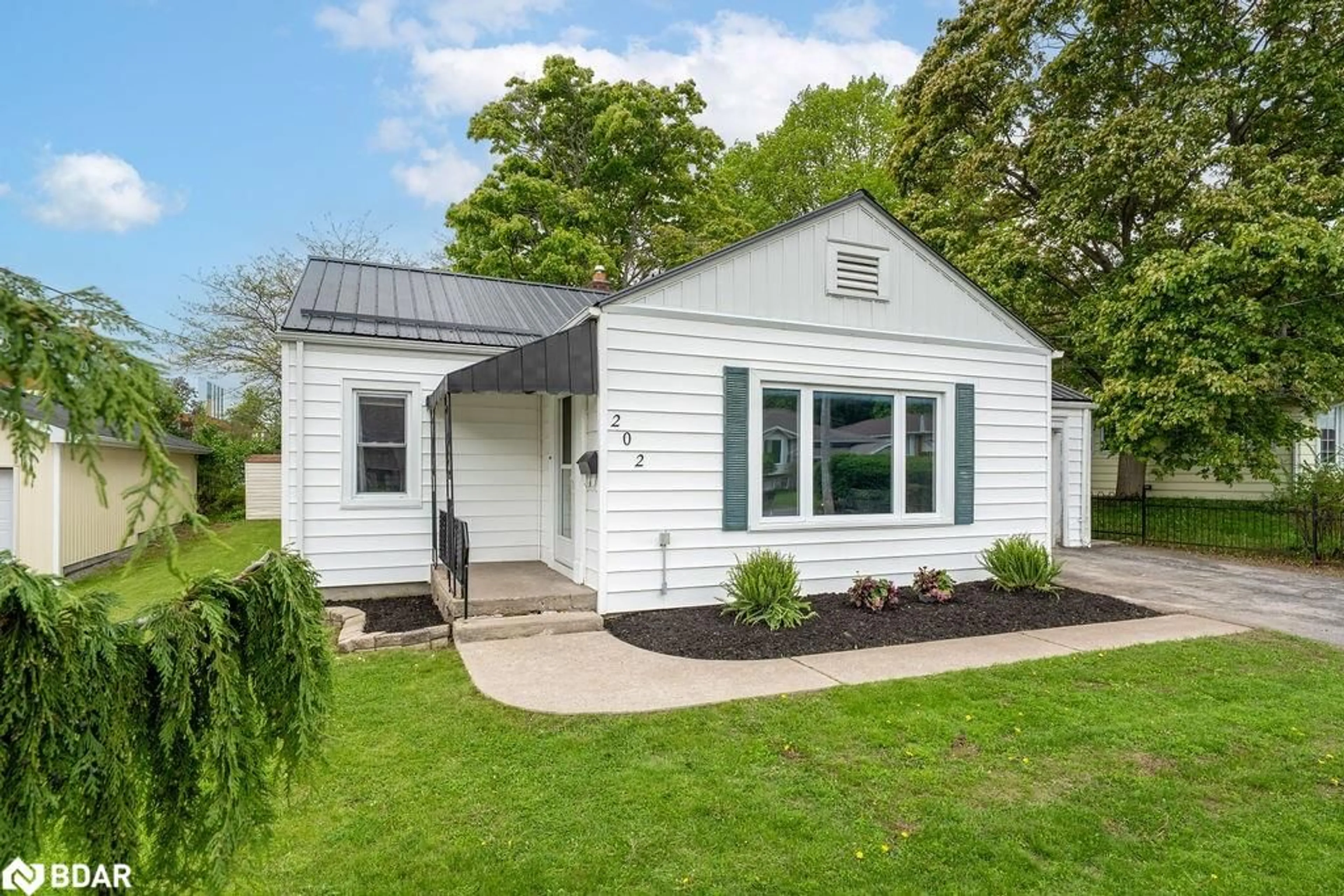 Home with vinyl exterior material, street for 202 Maclellan Ave, Quinte West Ontario K8V 5J4
