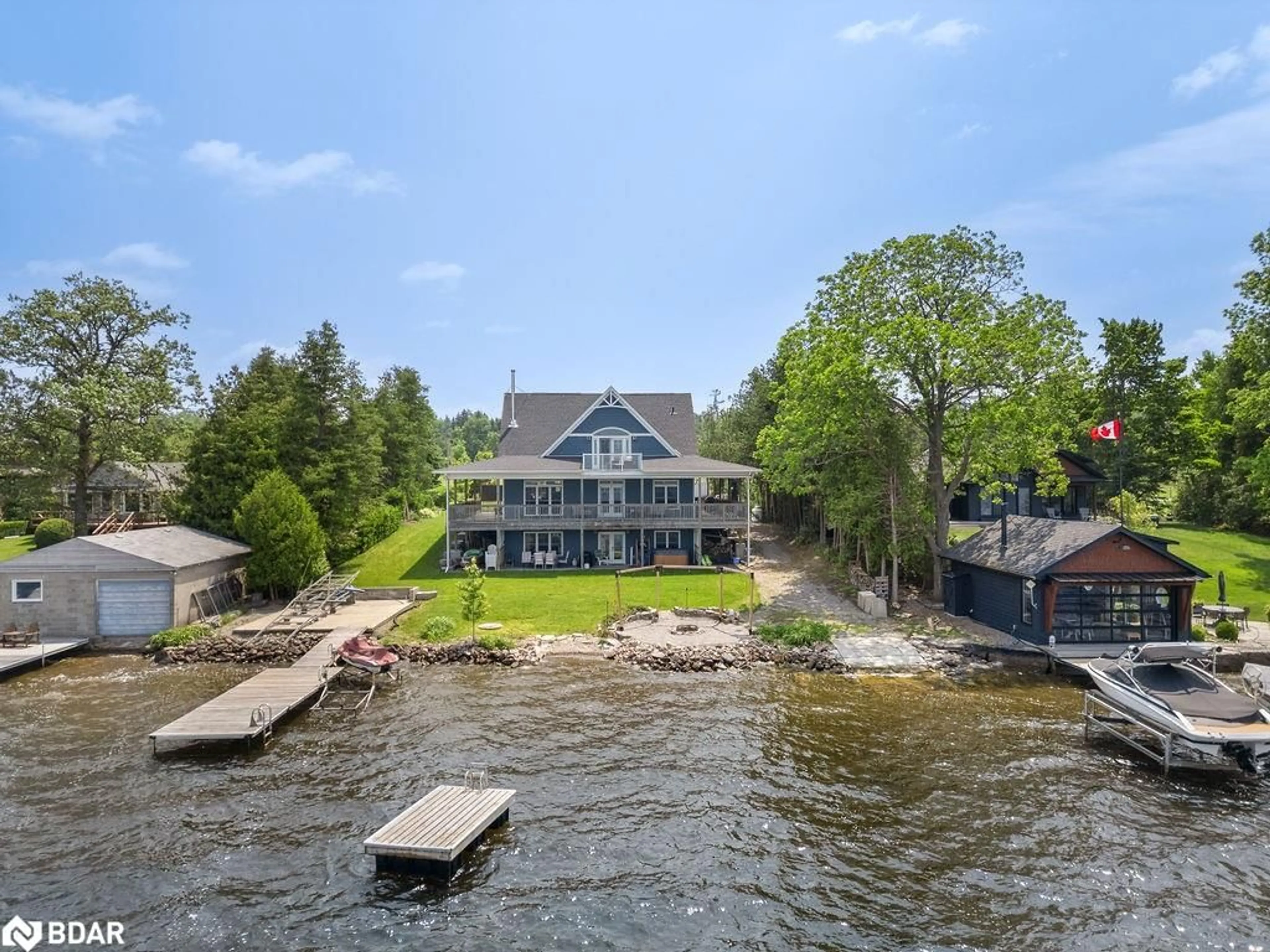 A pic from outside/outdoor area/front of a property/back of a property/a pic from drone, water/lake/river/ocean view for 99 Stewarts Rd, Fenelon Falls Ontario K0M 1N0