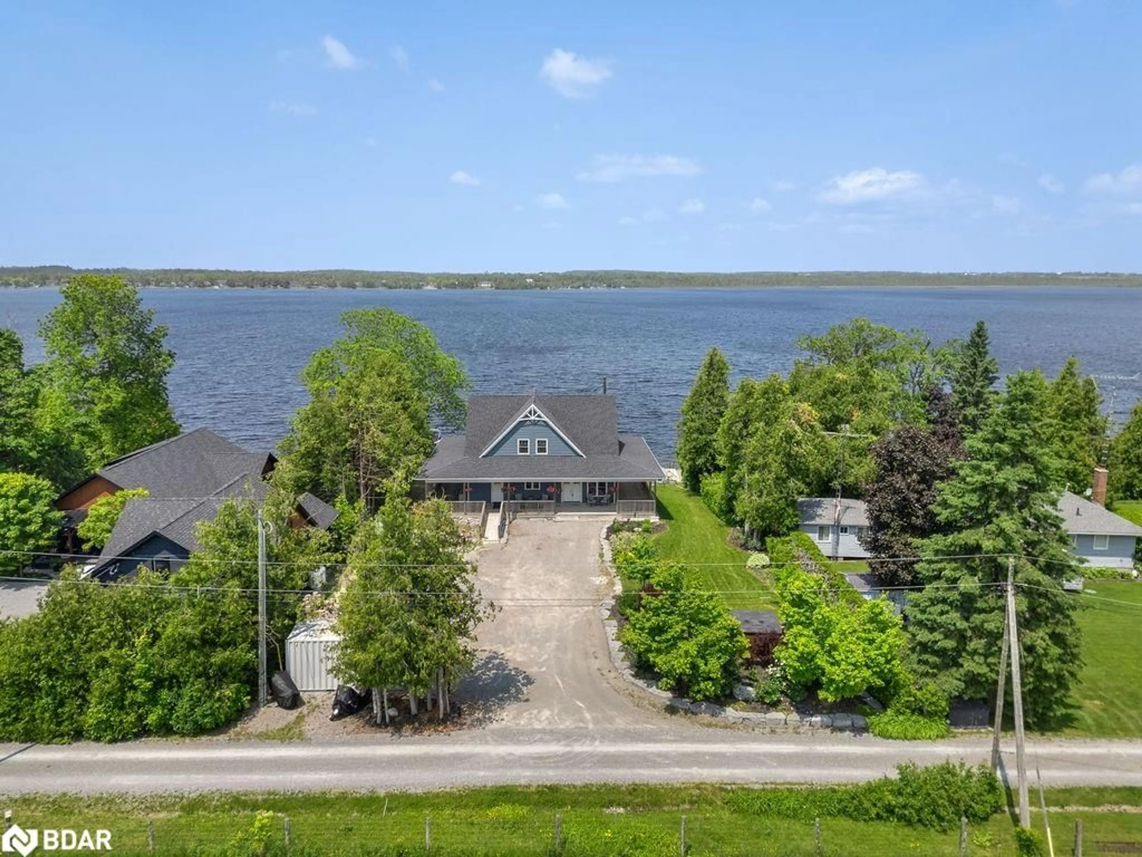 A pic from outside/outdoor area/front of a property/back of a property/a pic from drone, water/lake/river/ocean view for 99 Stewarts Rd, Fenelon Falls Ontario K0M 1N0