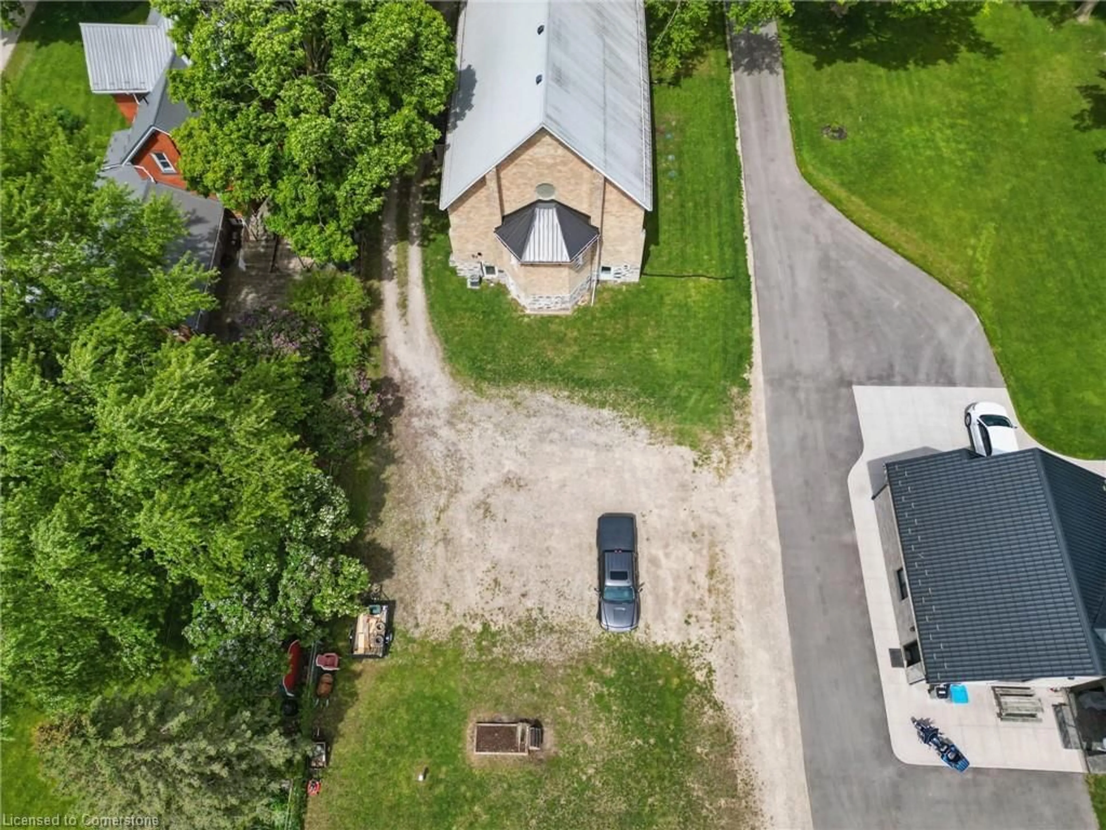 A pic from outside/outdoor area/front of a property/back of a property/a pic from drone, street for 247 West St, Trowbridge Ontario N4W 0L8