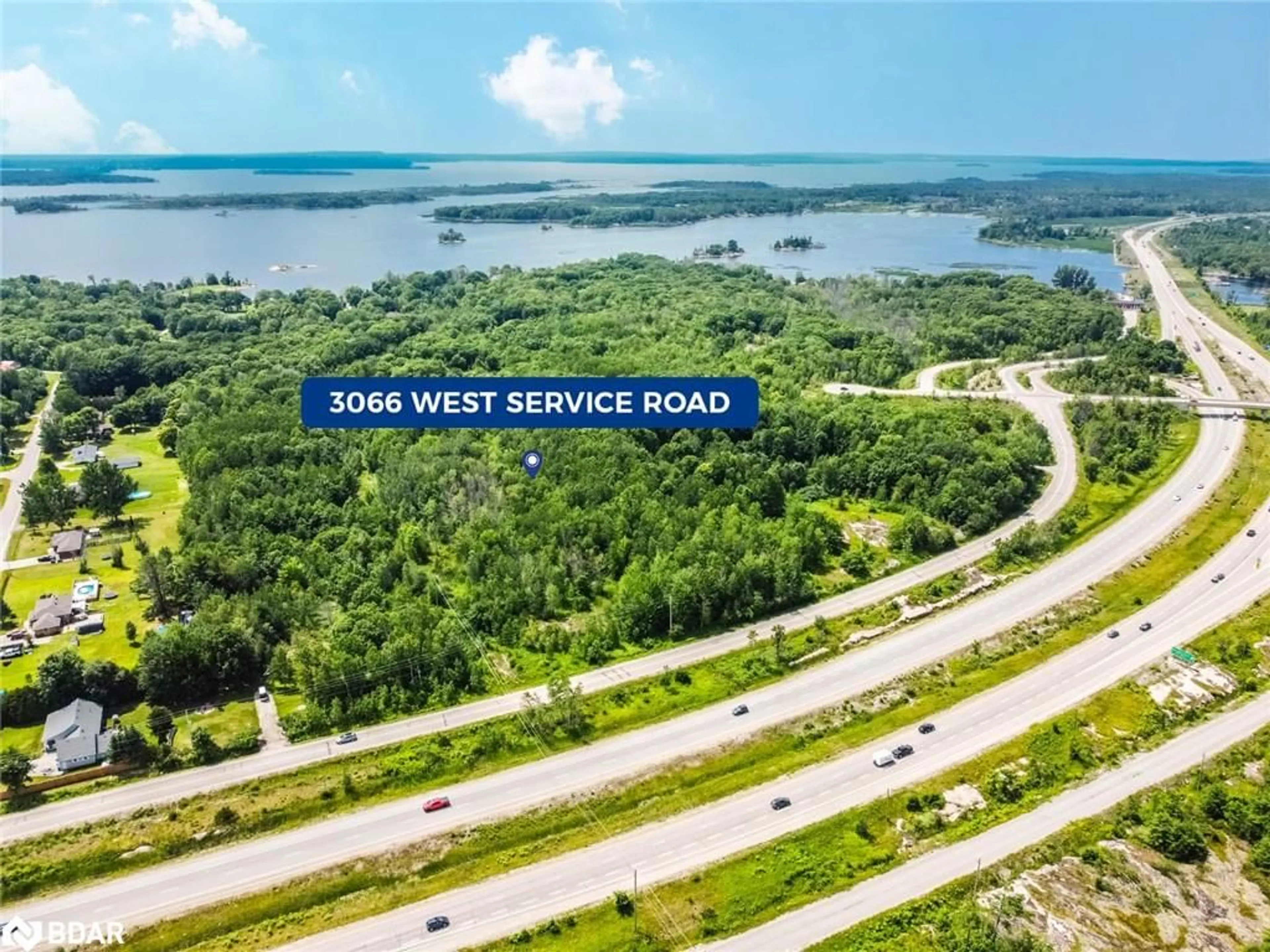 A pic from outside/outdoor area/front of a property/back of a property/a pic from drone, water/lake/river/ocean view for 3066 West Service Rd, Waubaushene Ontario L0K 2C0