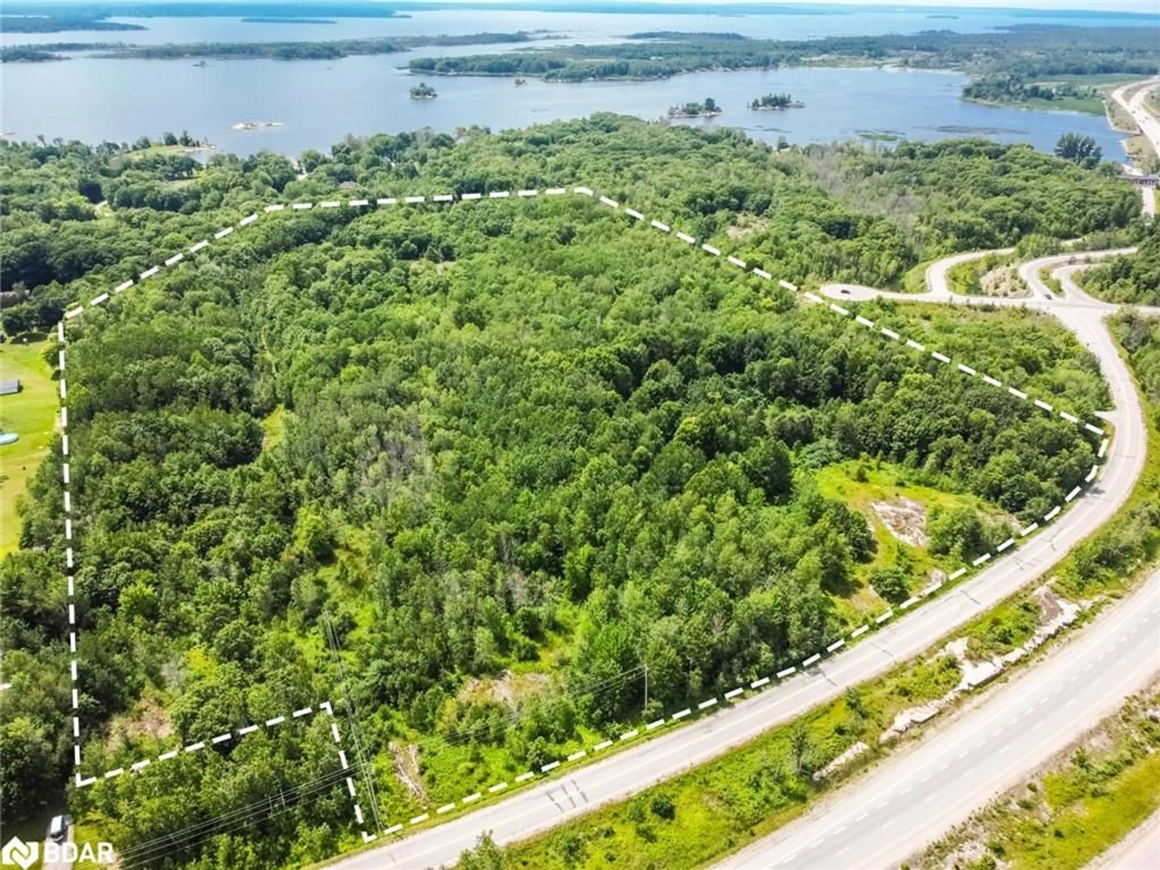 A pic from outside/outdoor area/front of a property/back of a property/a pic from drone, water/lake/river/ocean view for 3066 West Service Rd, Waubaushene Ontario L0K 2C0