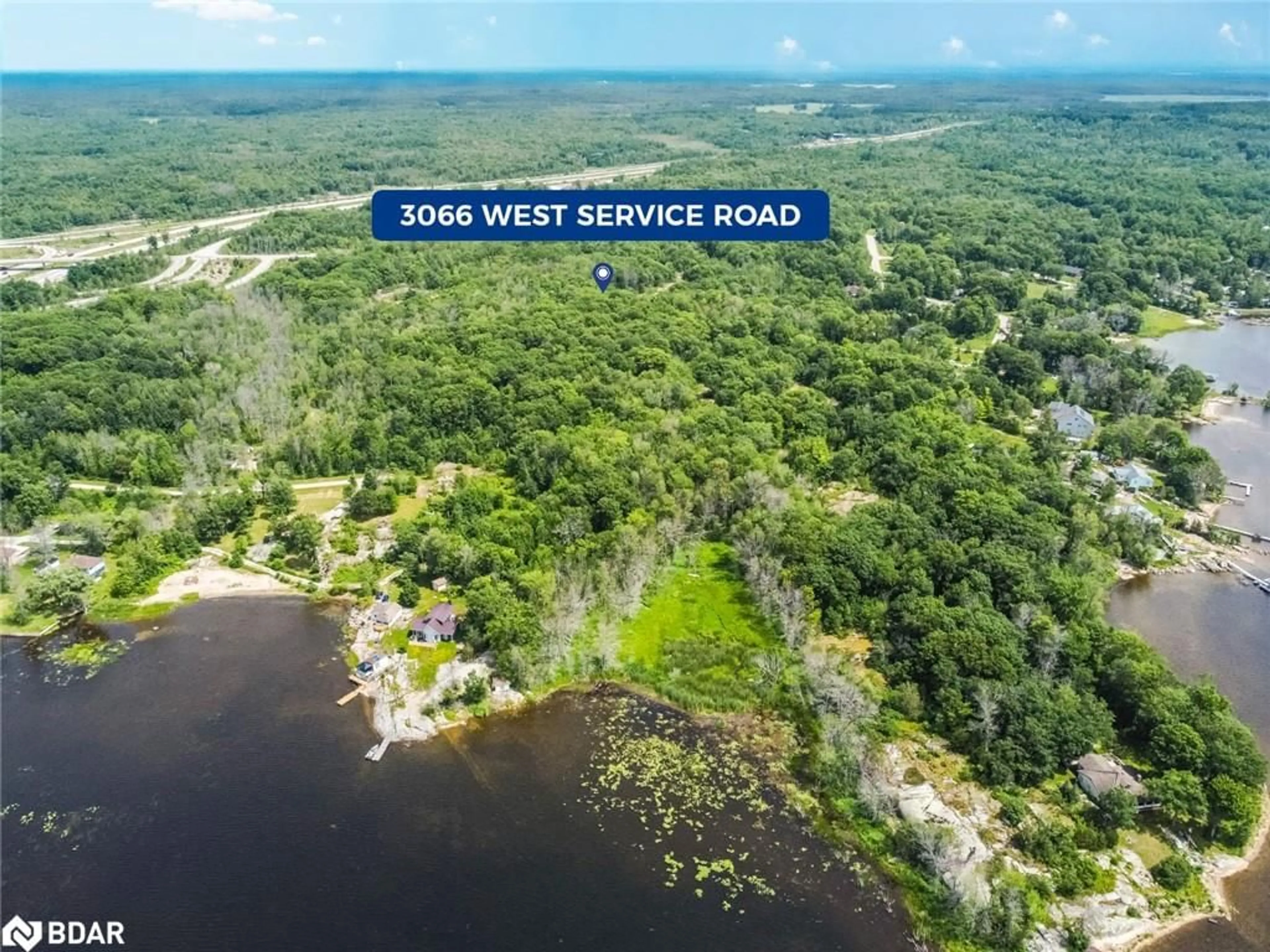 A pic from outside/outdoor area/front of a property/back of a property/a pic from drone, water/lake/river/ocean view for 3066 West Service Rd, Waubaushene Ontario L0K 2C0