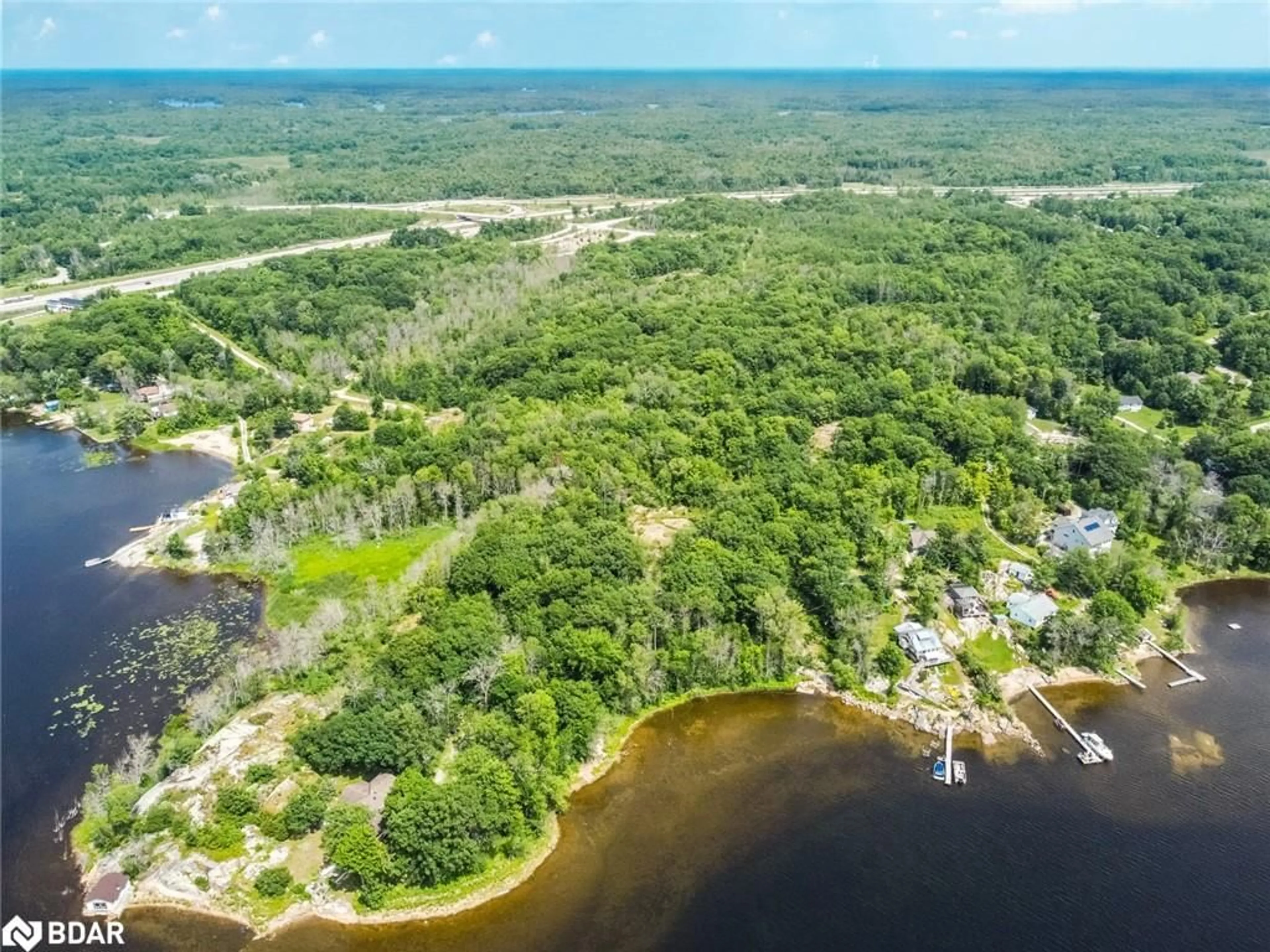 A pic from outside/outdoor area/front of a property/back of a property/a pic from drone, water/lake/river/ocean view for 3066 West Service Rd, Waubaushene Ontario L0K 2C0