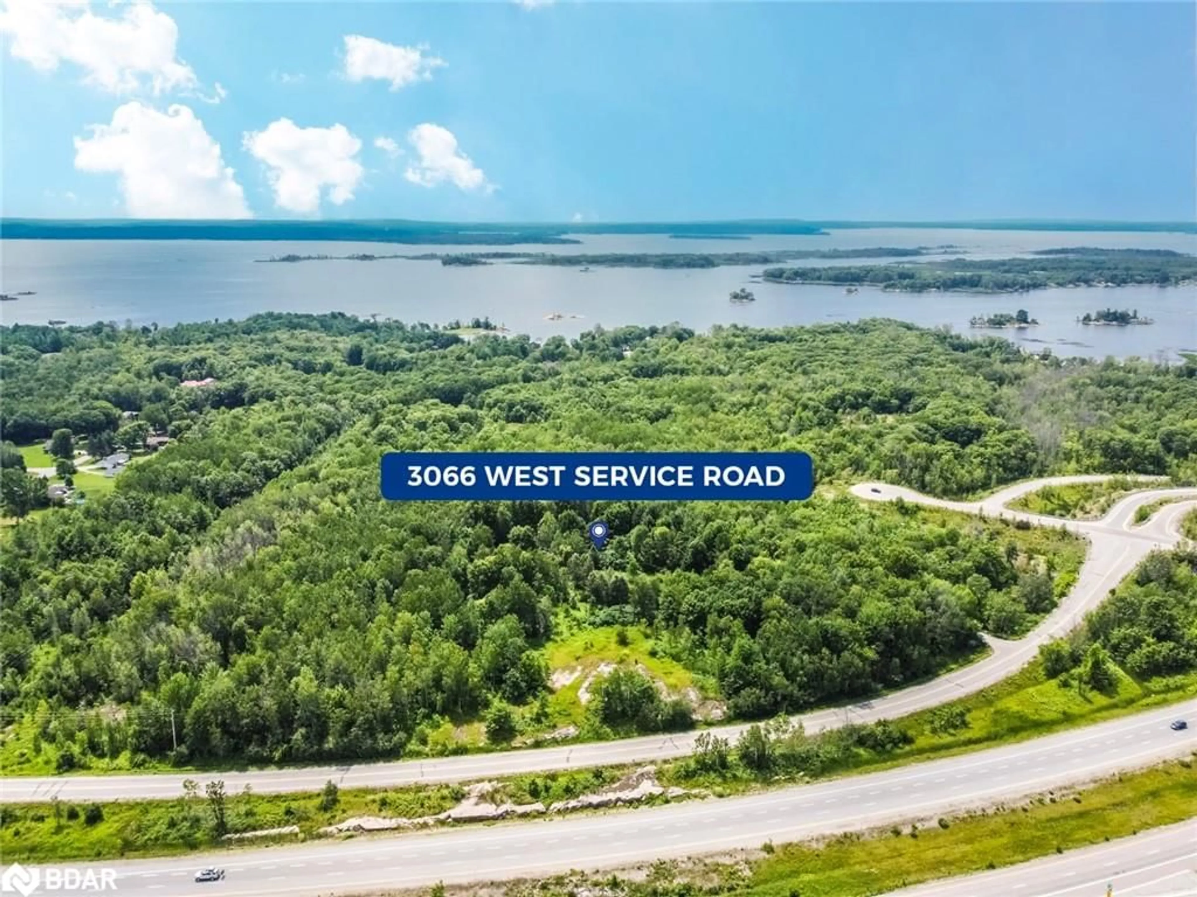 A pic from outside/outdoor area/front of a property/back of a property/a pic from drone, water/lake/river/ocean view for 3066 West Service Rd, Waubaushene Ontario L0K 2C0