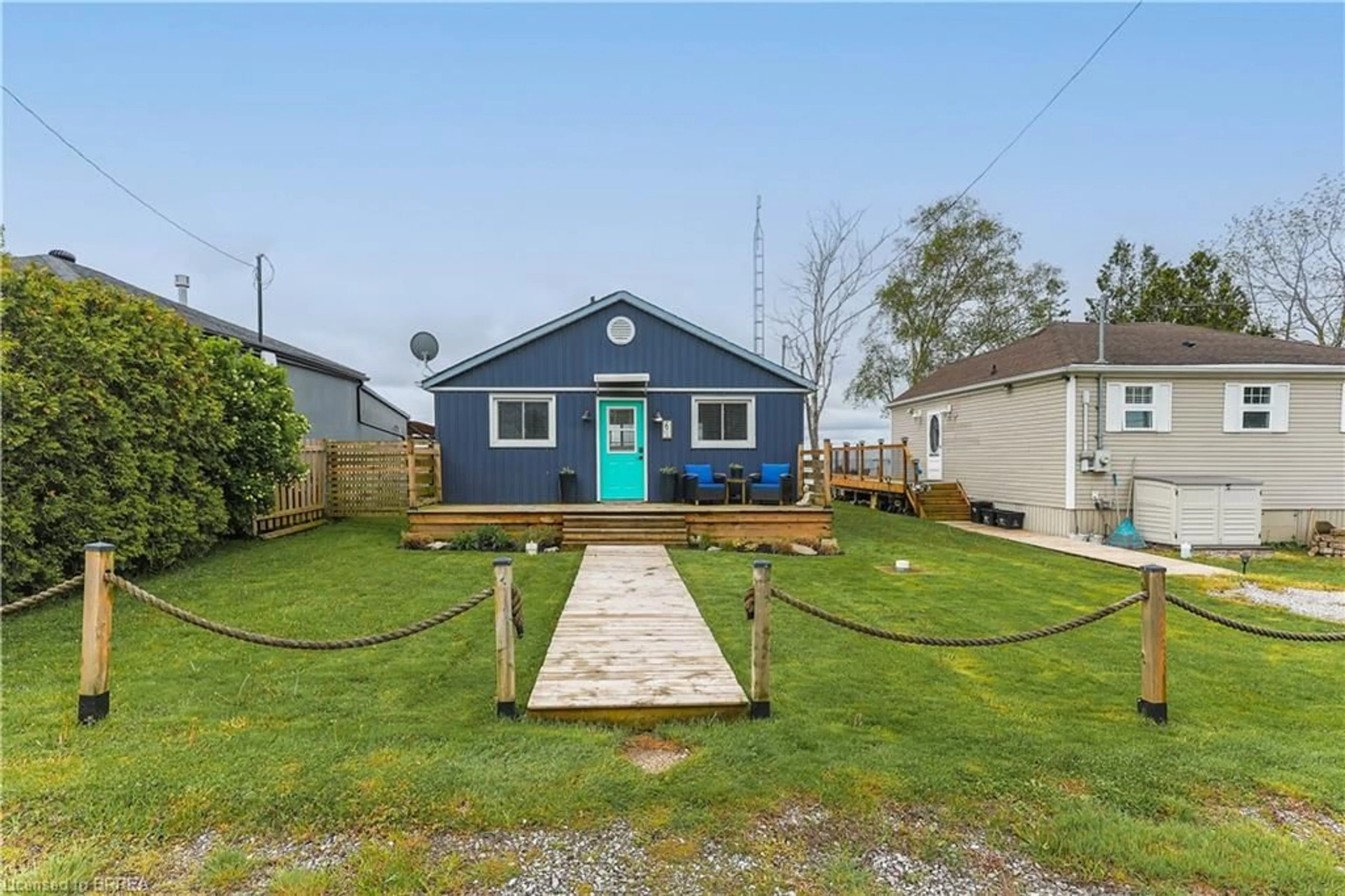 A pic from outside/outdoor area/front of a property/back of a property/a pic from drone, street for 6 Hickory Beach Lane, Nanticoke Ontario N0A 1L0