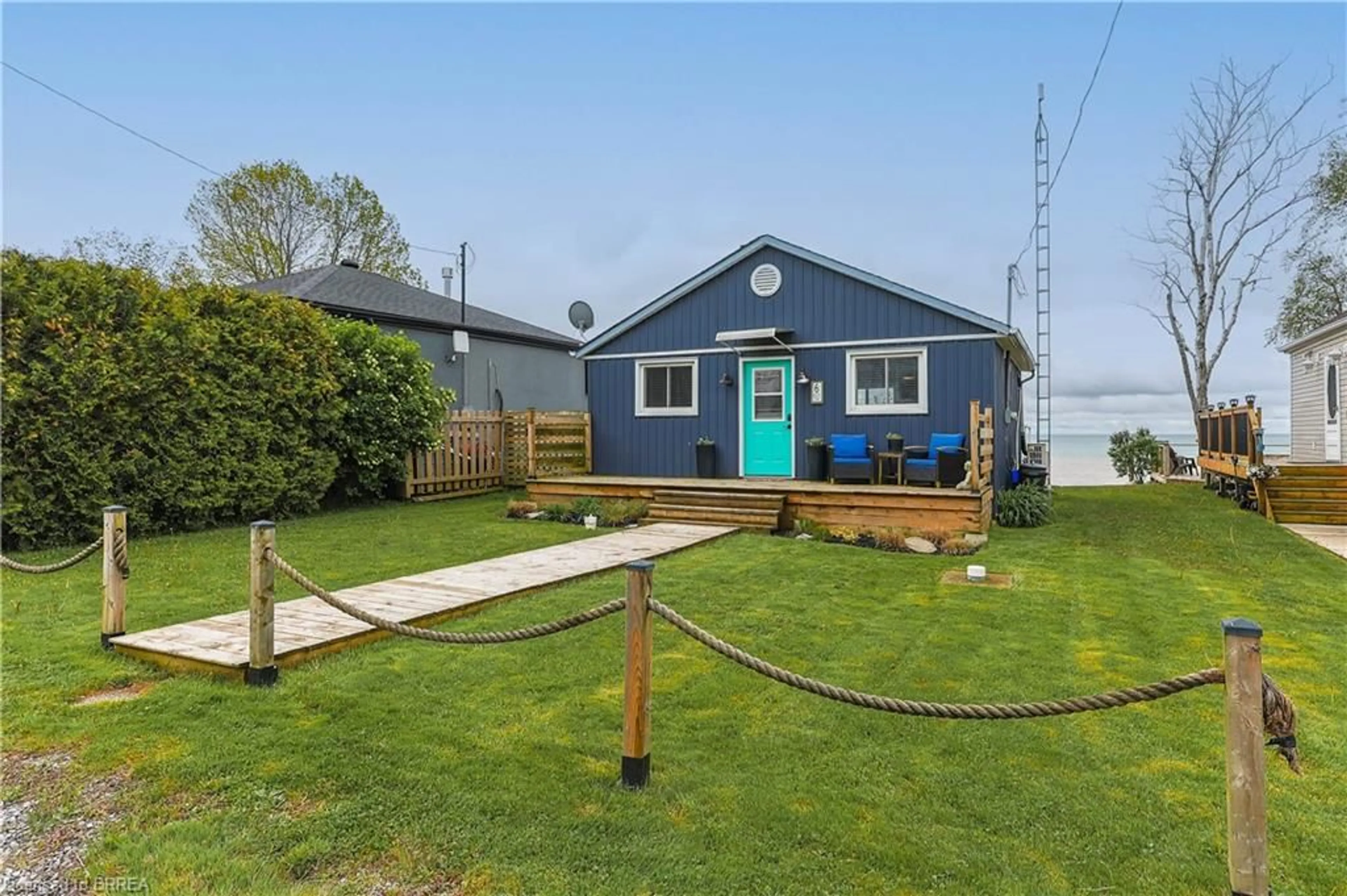 A pic from outside/outdoor area/front of a property/back of a property/a pic from drone, water/lake/river/ocean view for 6 Hickory Beach Lane, Nanticoke Ontario N0A 1L0