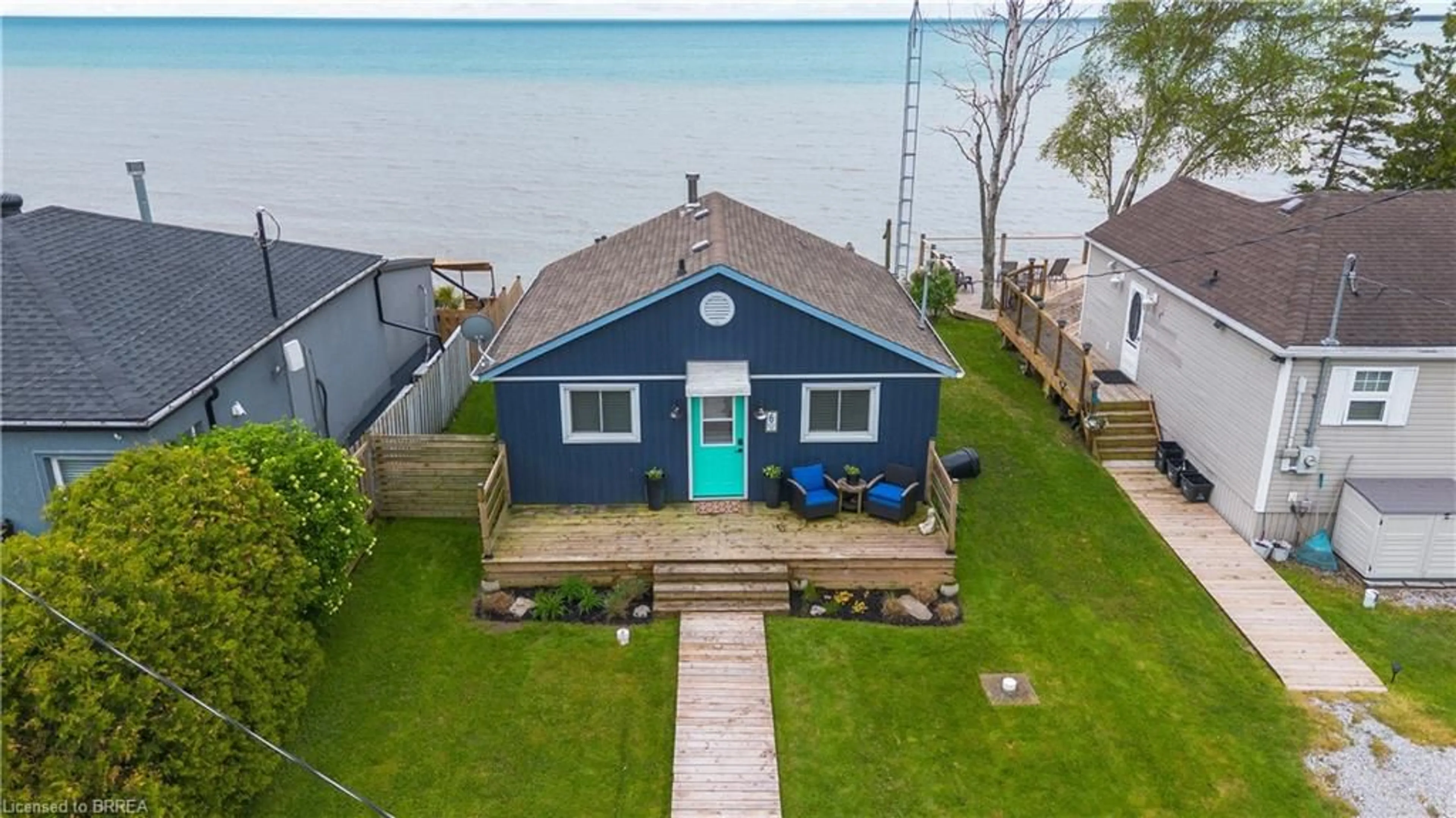 A pic from outside/outdoor area/front of a property/back of a property/a pic from drone, water/lake/river/ocean view for 6 Hickory Beach Lane, Nanticoke Ontario N0A 1L0