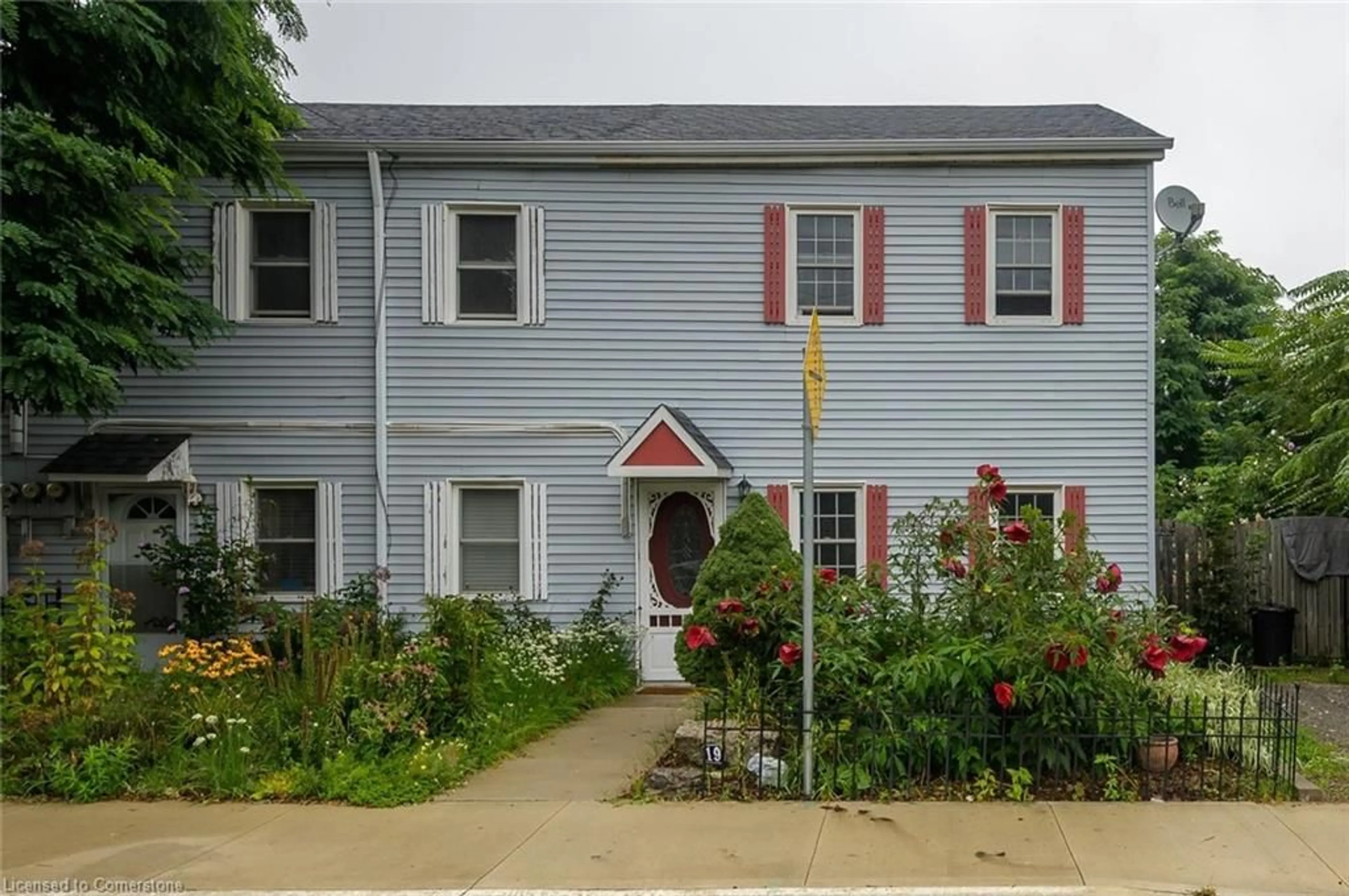 Home with vinyl exterior material, street for 19 Strachan St, Hamilton Ontario L8S 1S4