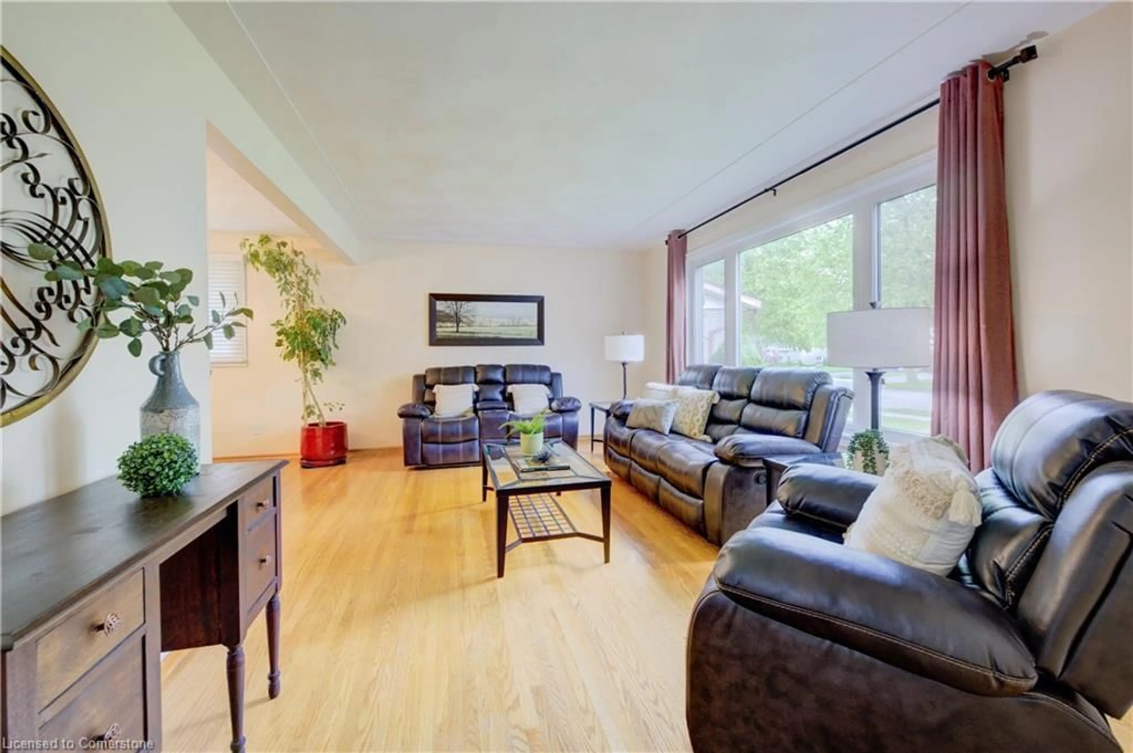 Living room with furniture, wood/laminate floor for 90 Indian Rd, Kitchener Ontario N2B 2S5