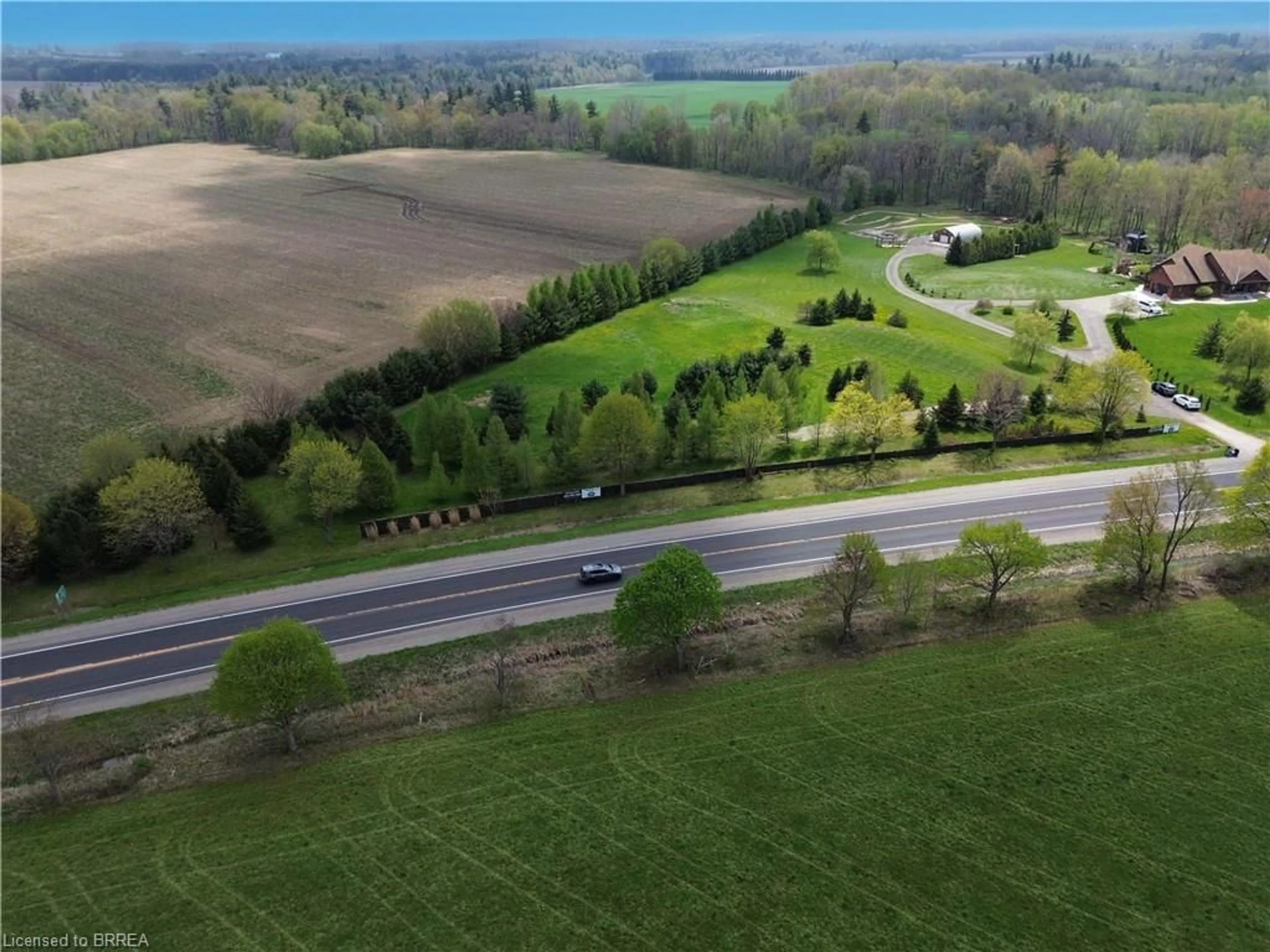 A pic from outside/outdoor area/front of a property/back of a property/a pic from drone, forest/trees view for 38B Highway 24, Scotland Ontario N0E 1R0
