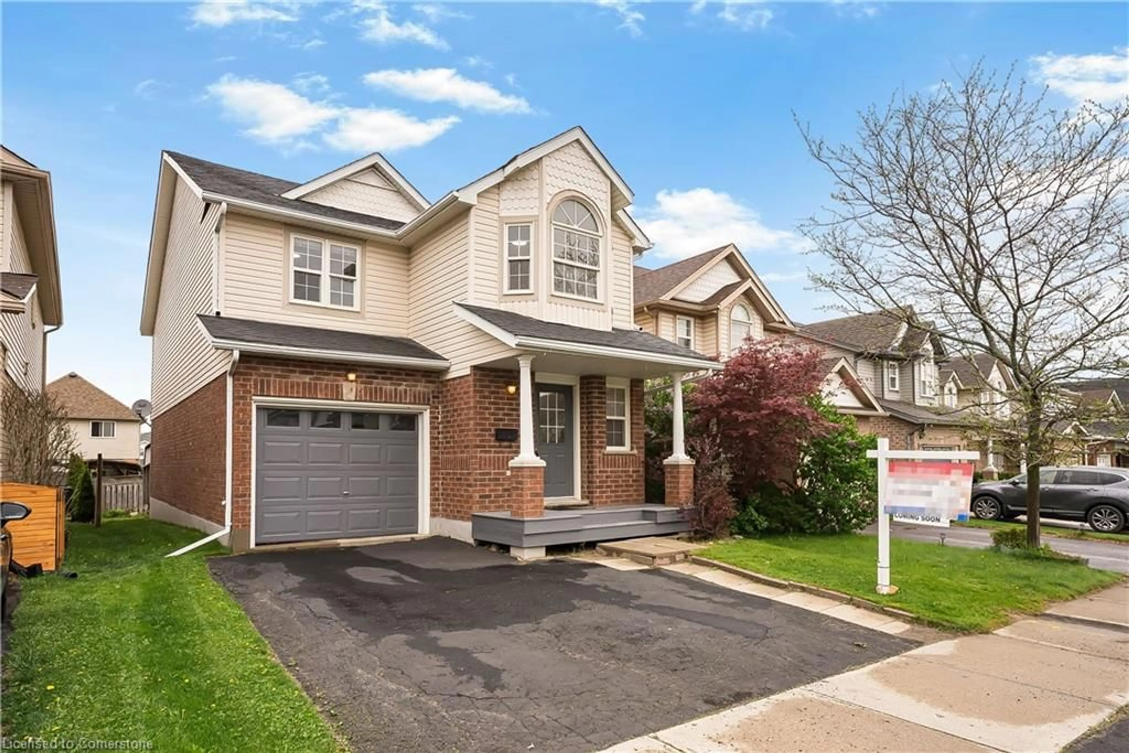 Home with brick exterior material, street for 74 Blue Lace Cres, Kitchener Ontario N2E 3X1