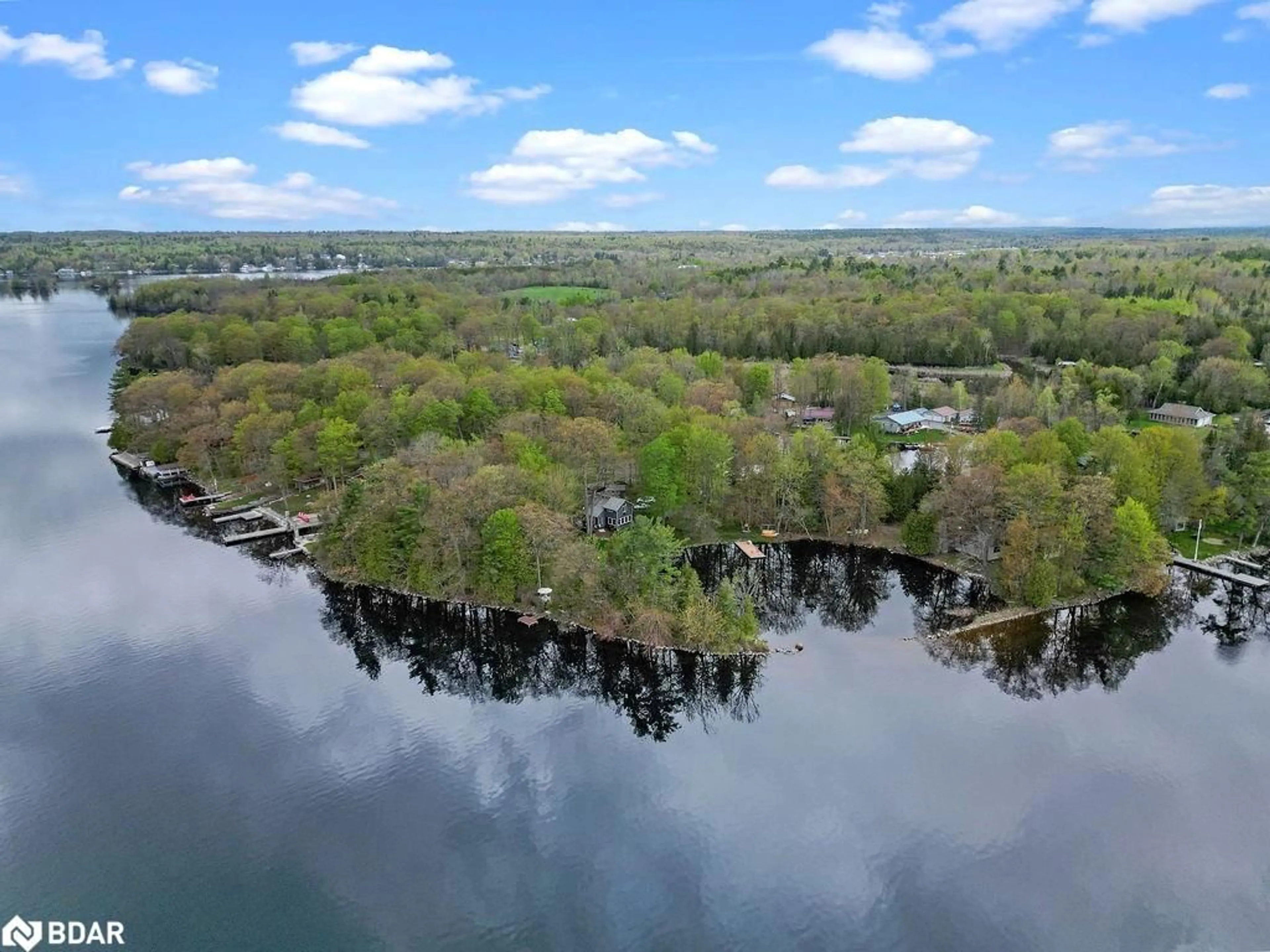 A pic from outside/outdoor area/front of a property/back of a property/a pic from drone, water/lake/river/ocean view for 68 Fire Route 103b, Trent Lakes Ontario K0M 1A0