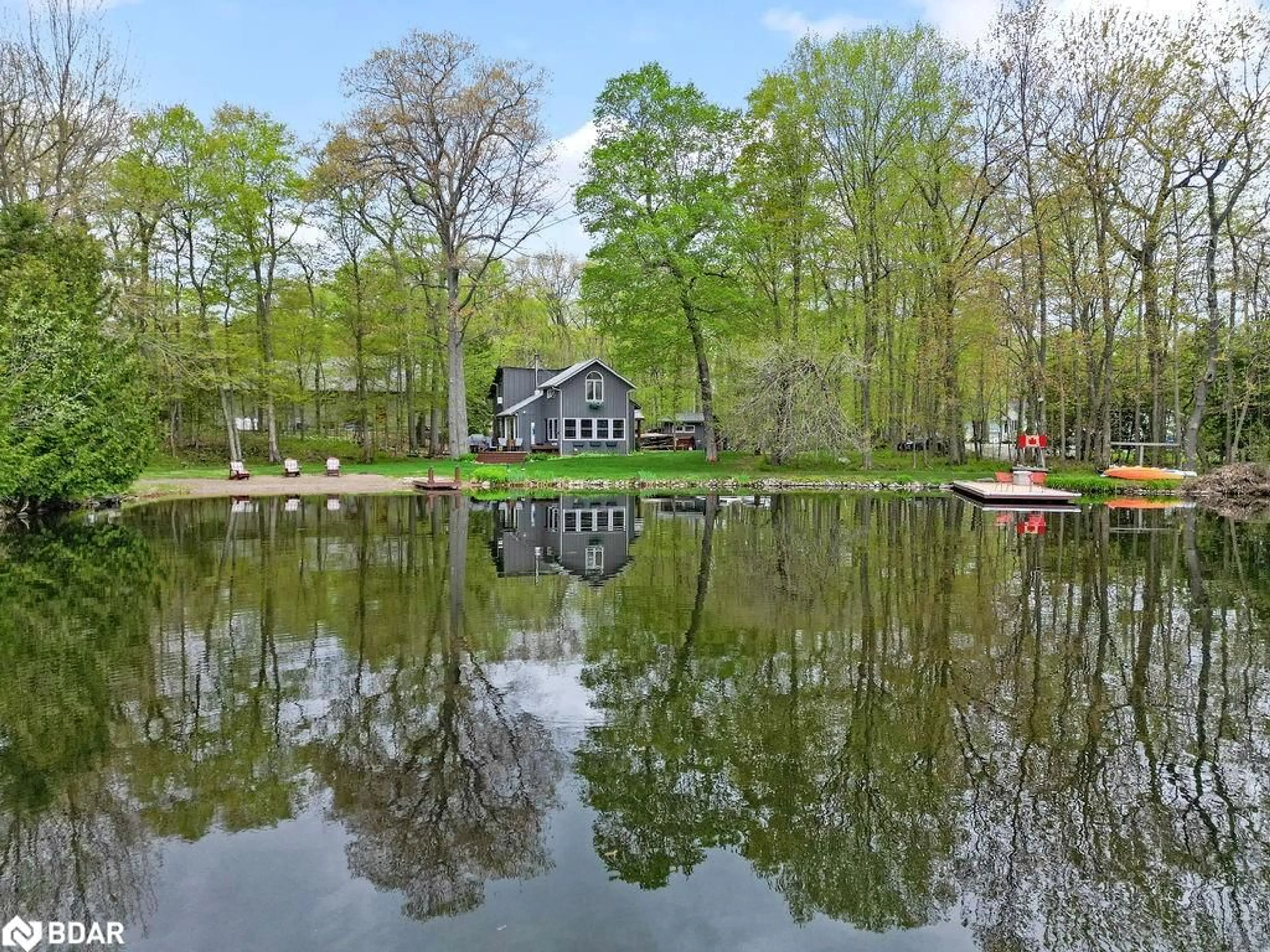 A pic from outside/outdoor area/front of a property/back of a property/a pic from drone, water/lake/river/ocean view for 68 Fire Route 103b, Trent Lakes Ontario K0M 1A0
