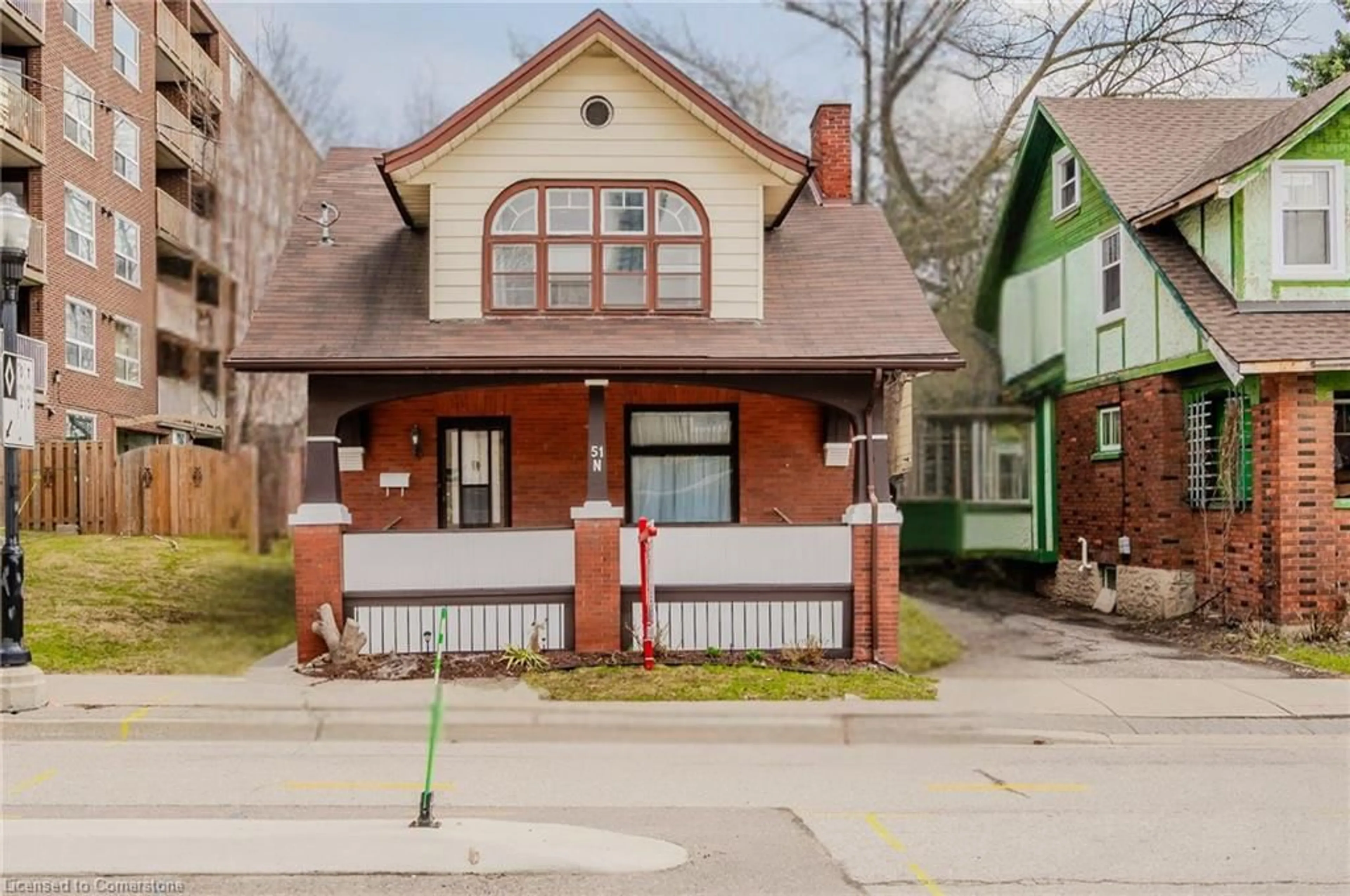 Home with brick exterior material, street for 51 Cedar St, Kitchener Ontario N2H 2W9