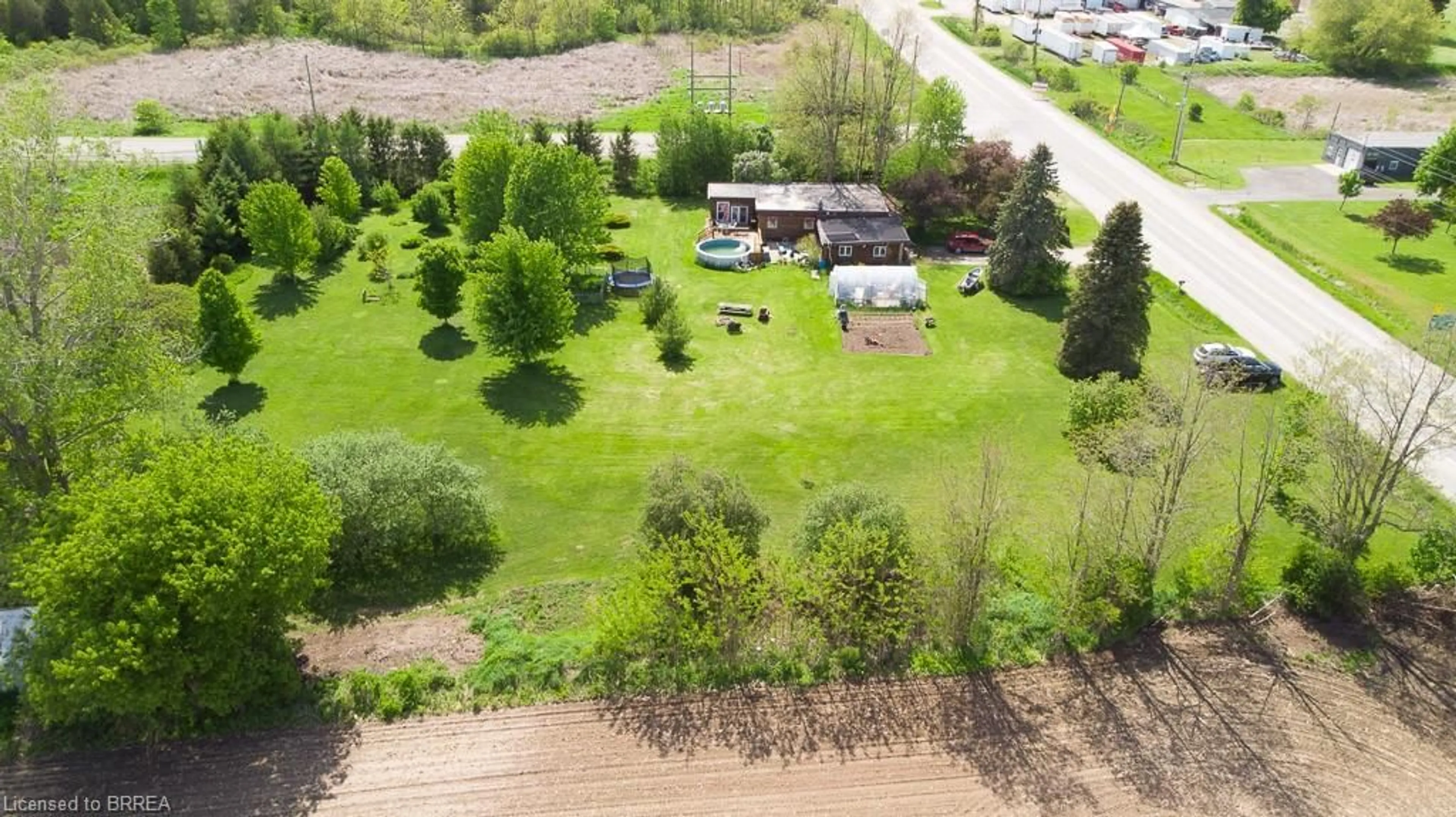 A pic from outside/outdoor area/front of a property/back of a property/a pic from drone, forest/trees view for 239 Hwy 2, Princeton Ontario N0J 1V0