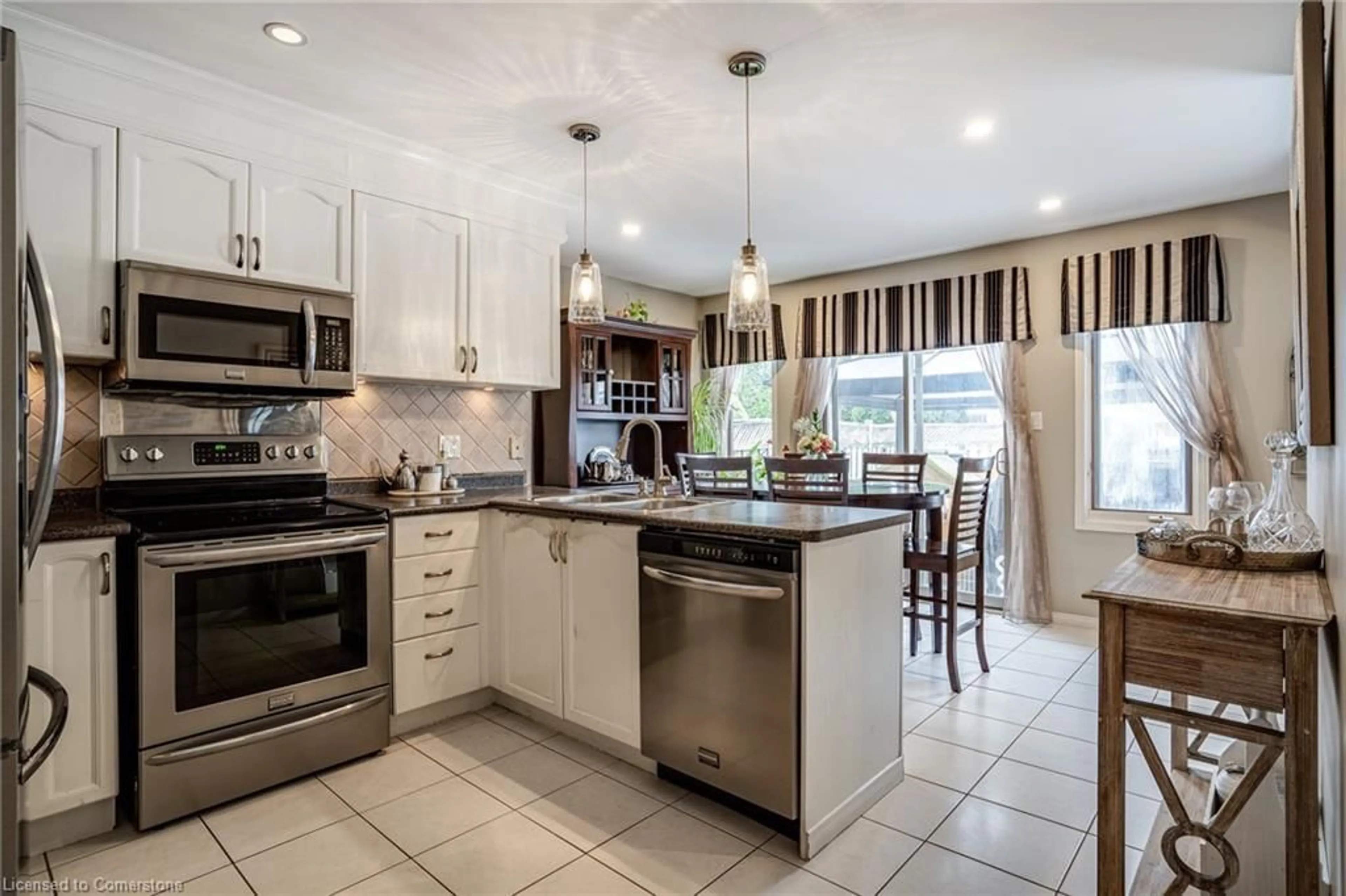 Open concept kitchen, ceramic/tile floor for 19 Claudette Gate, Hamilton Ontario L9B 2S3