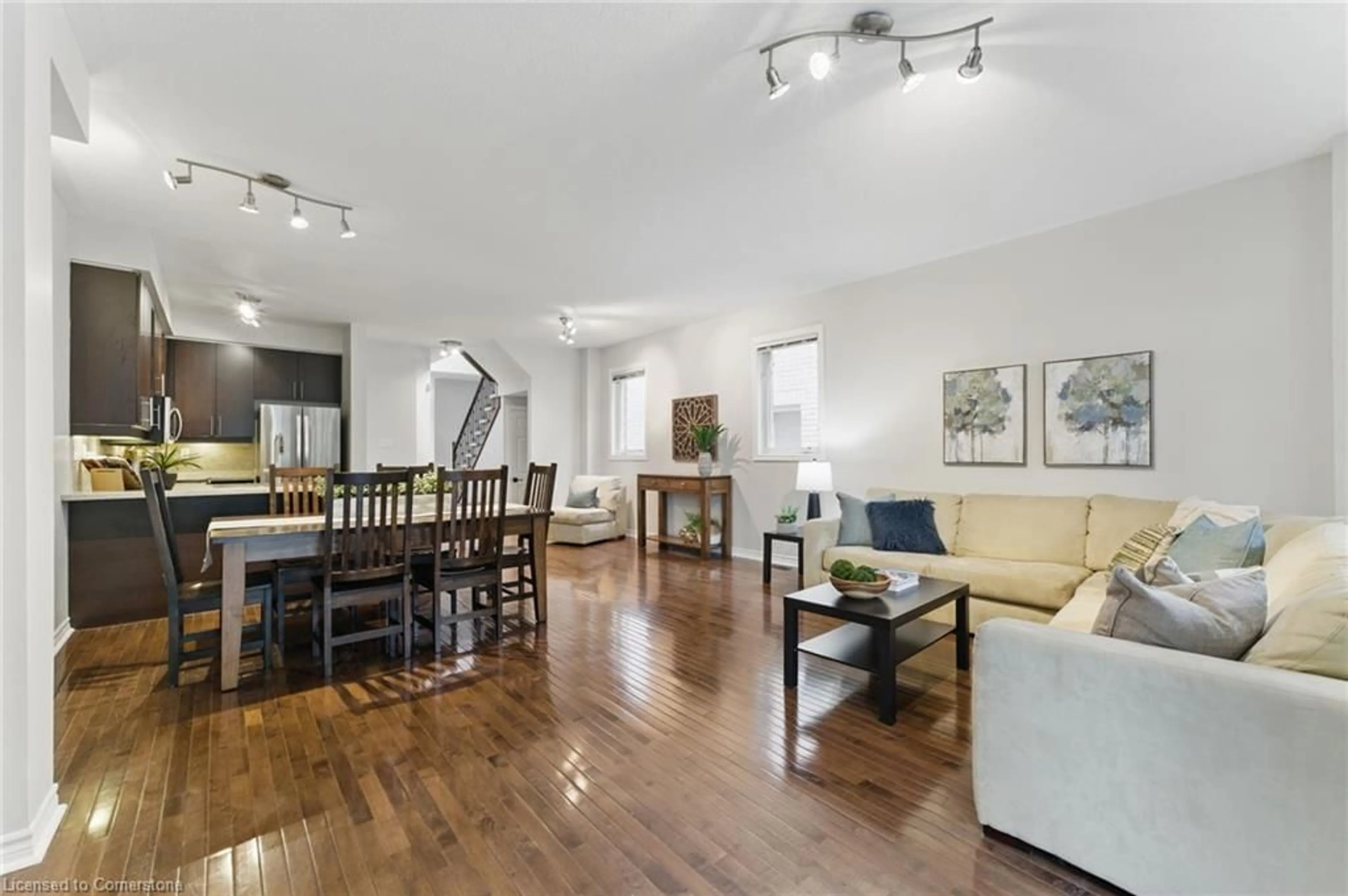 Living room with furniture, wood/laminate floor for 110 Highland Rd #19, Kitchener Ontario N2M 3S1