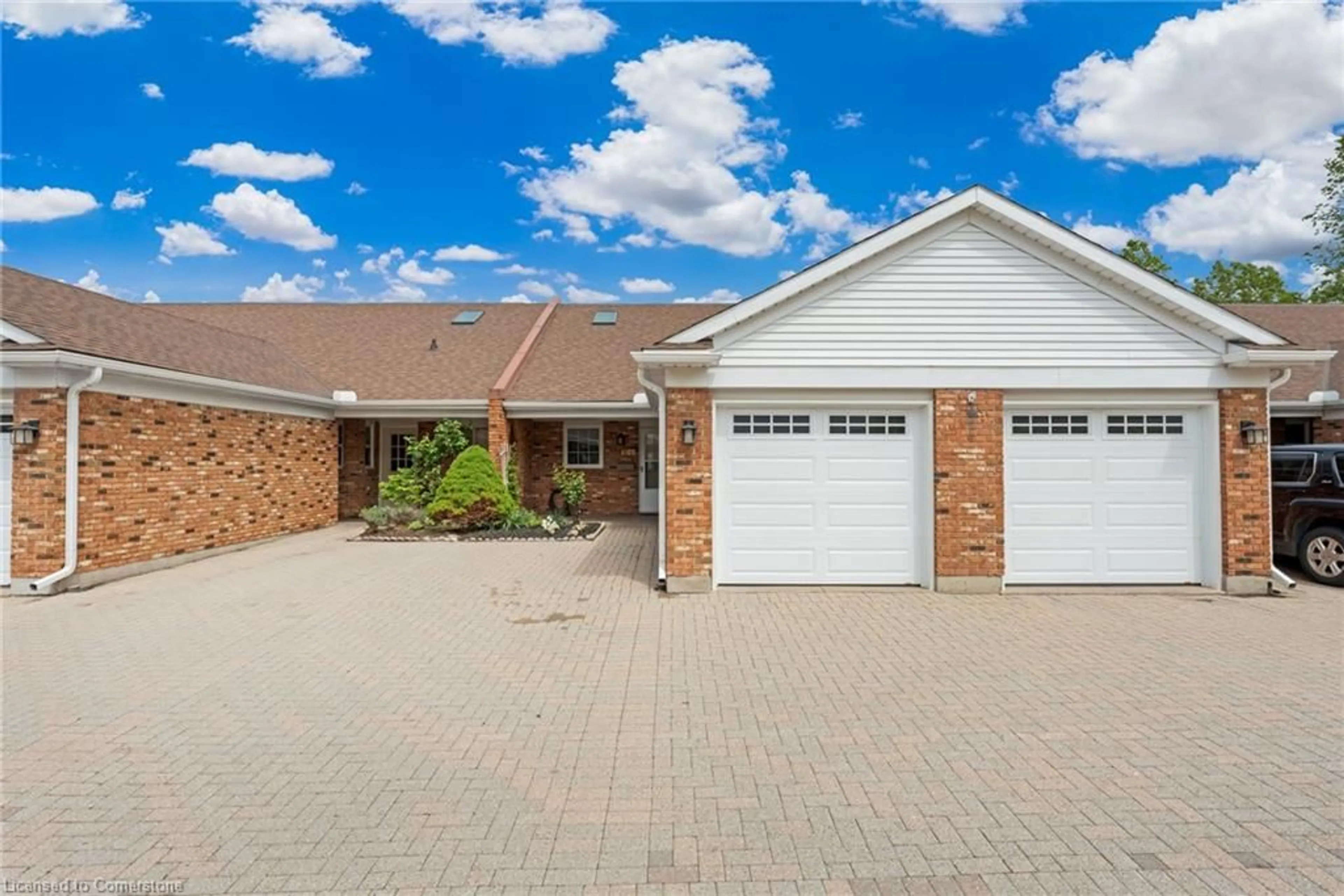 Home with brick exterior material, street for 4107 Cherry Blossom Lane, Vineland Ontario L0R 2C0