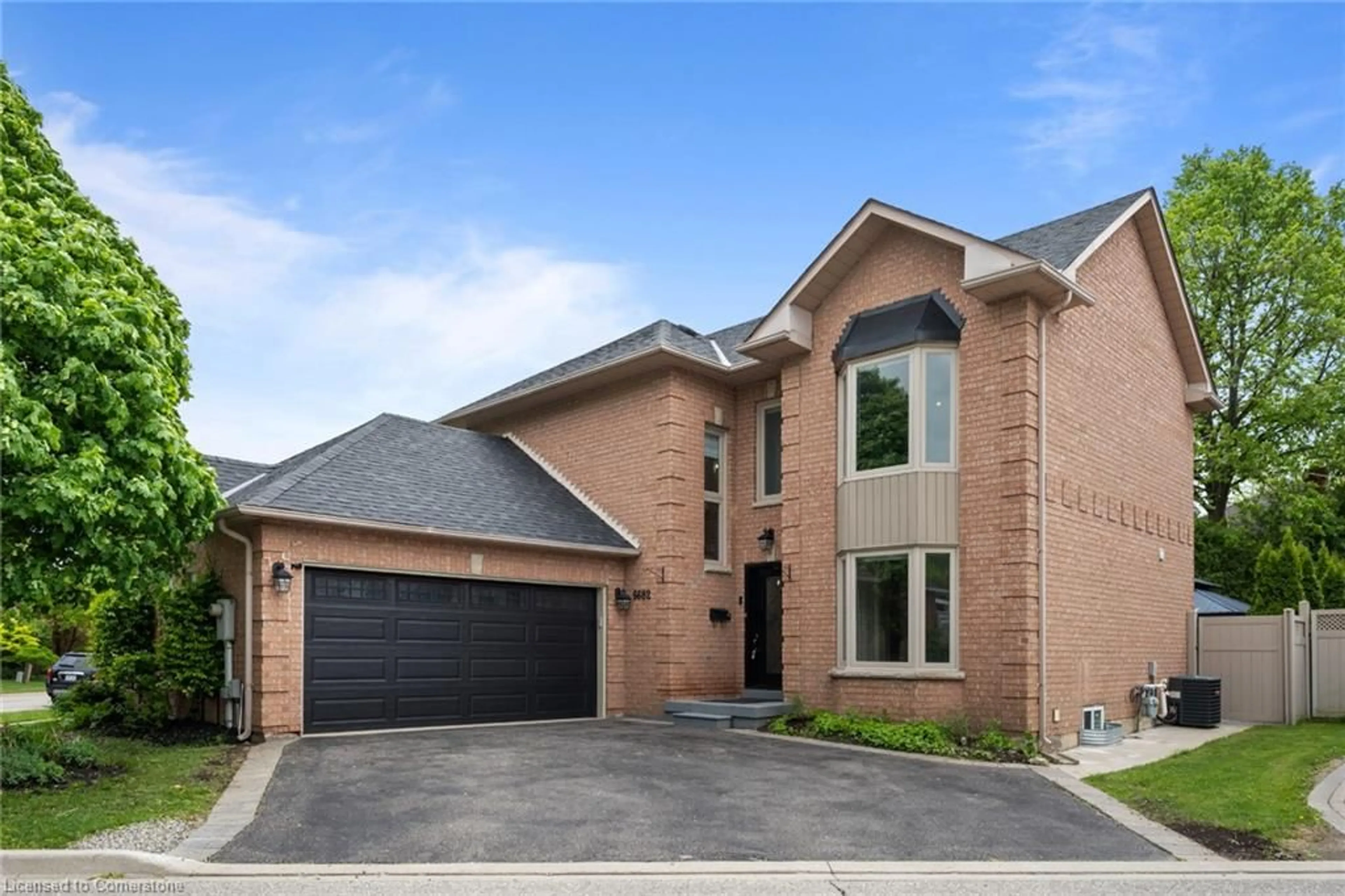 Home with brick exterior material, street for 6682 Snow Goose Lanes, Mississauga Ontario L5N 5H8