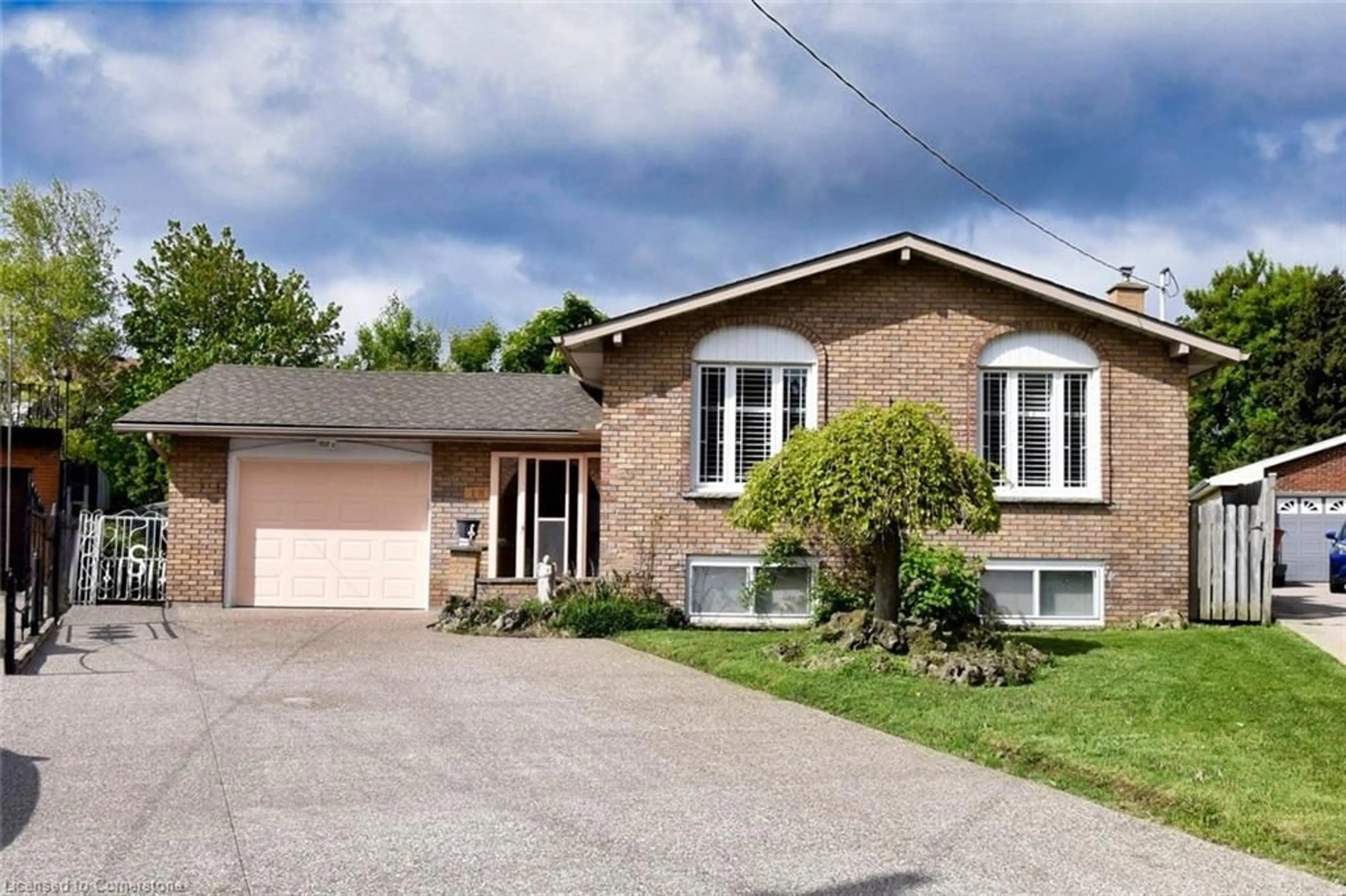 Home with brick exterior material, street for 18 Villa Crt, Hamilton Ontario L8W 1M2