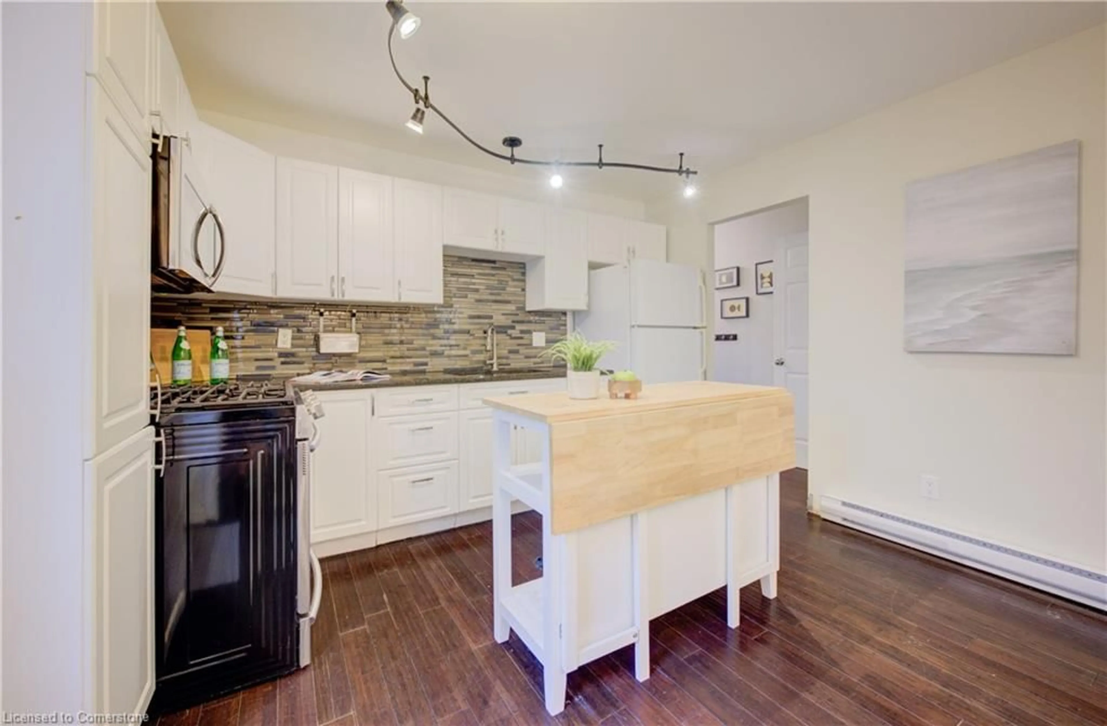 Open concept kitchen, wood/laminate floor for 192 Silver Aspen Cres, Kitchener Ontario N2N 1J1