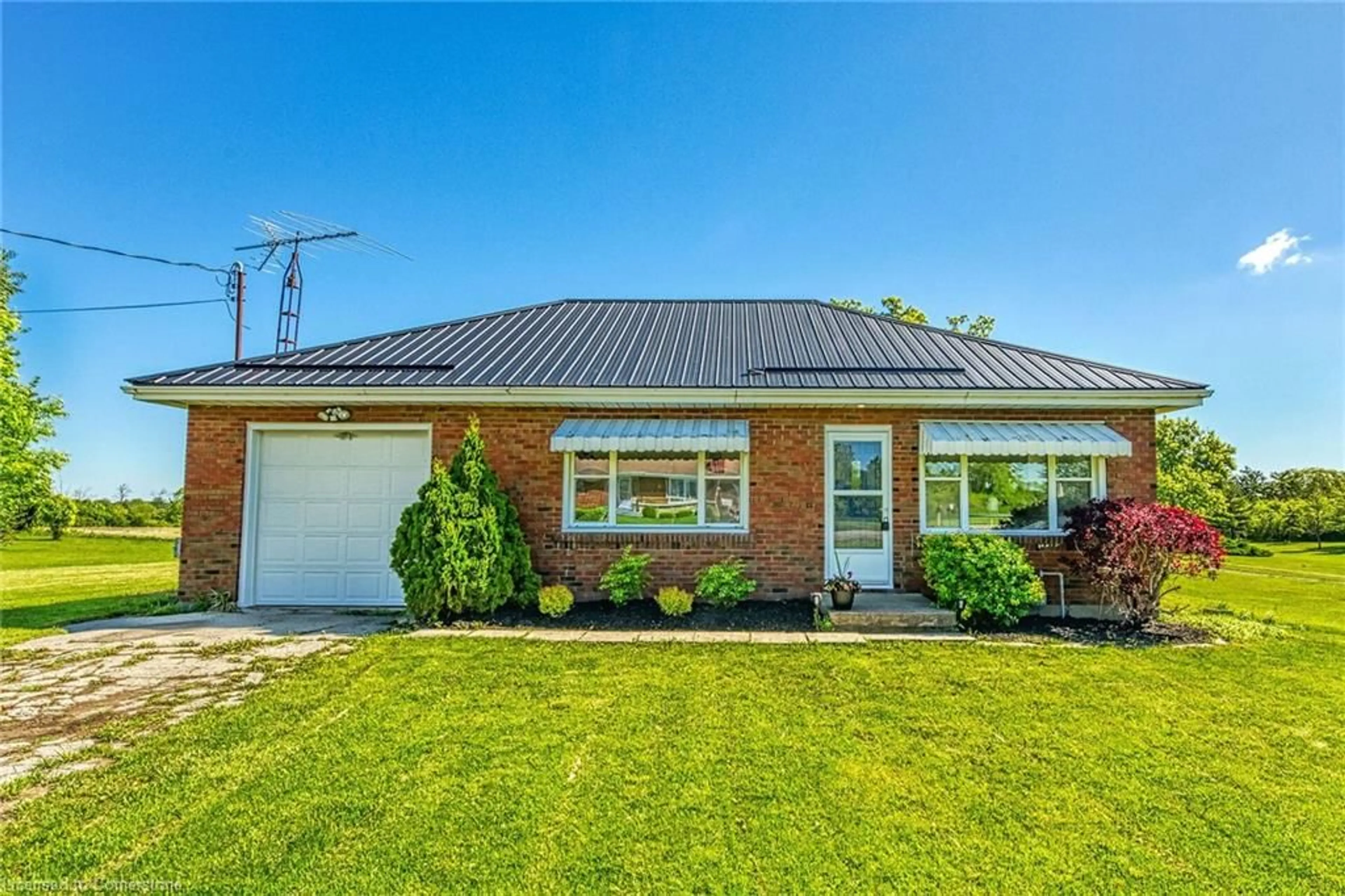 Home with brick exterior material, street for 121 Port Maitland Rd, Dunnville Ontario N1A 2W6