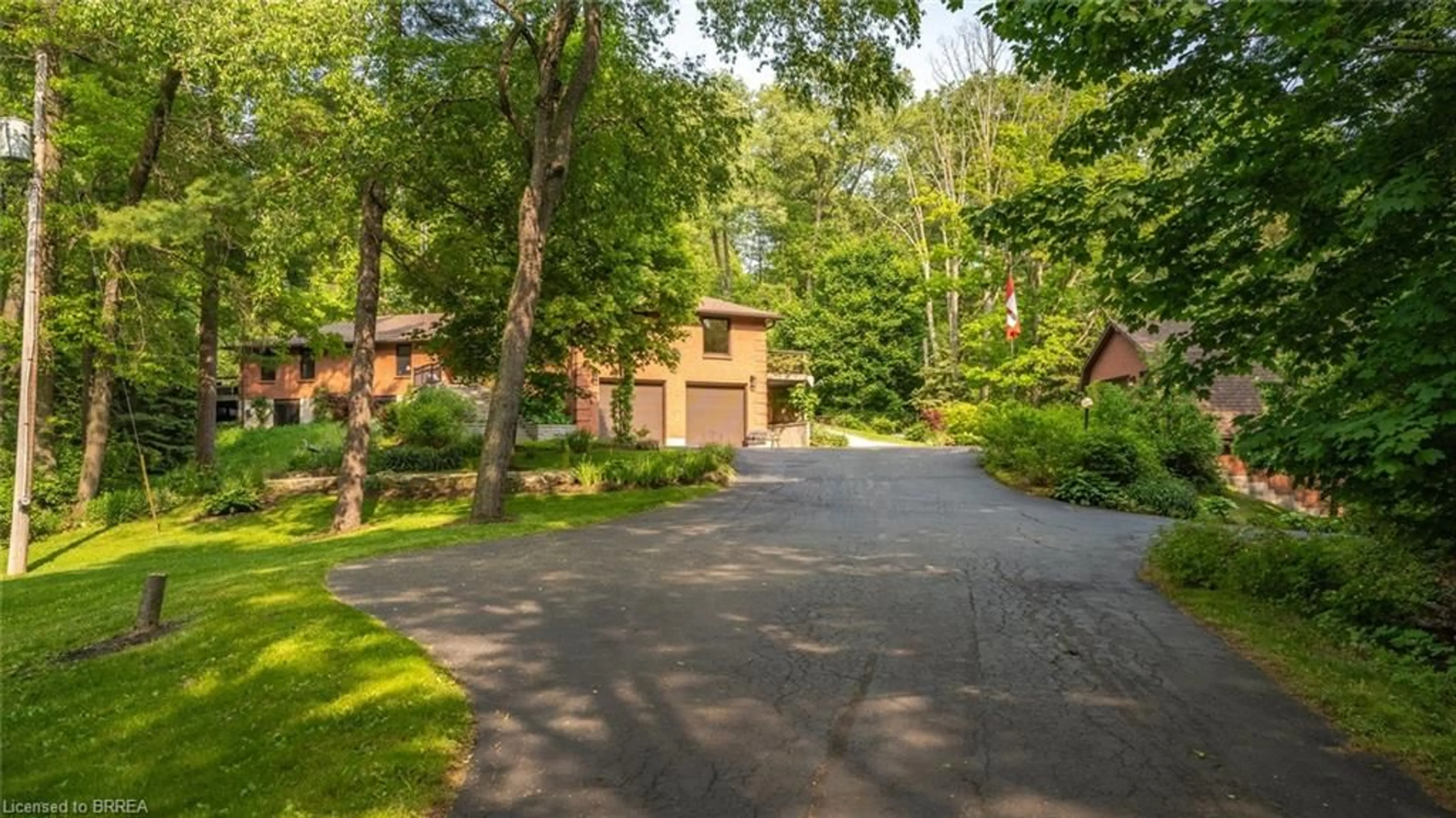 A pic from outside/outdoor area/front of a property/back of a property/a pic from drone, street for 520 Blue Lake Rd, St. George Ontario N0E 1N0