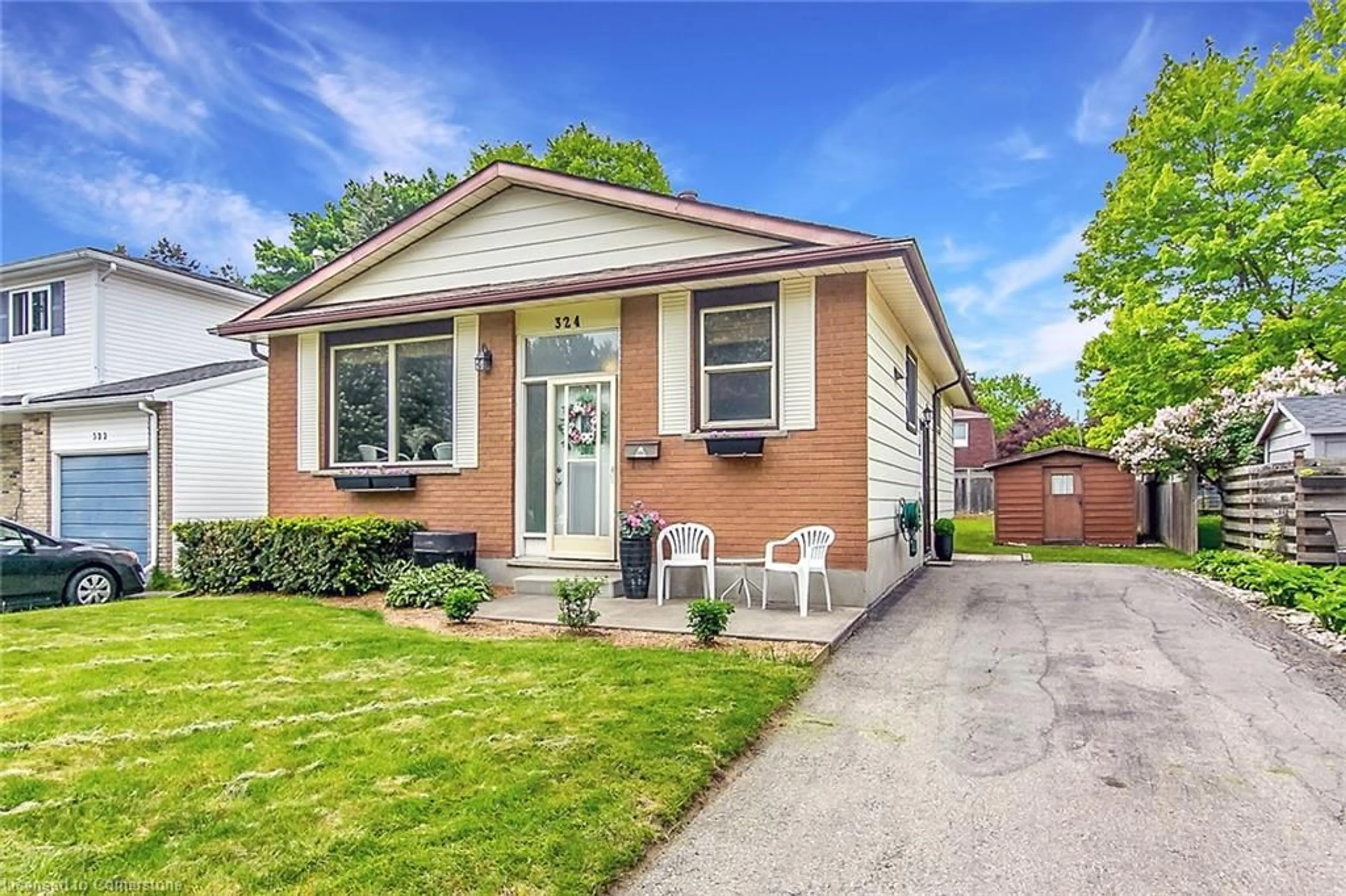 Home with brick exterior material, street for 324 Concordia Cres, Waterloo Ontario N2K 2M3