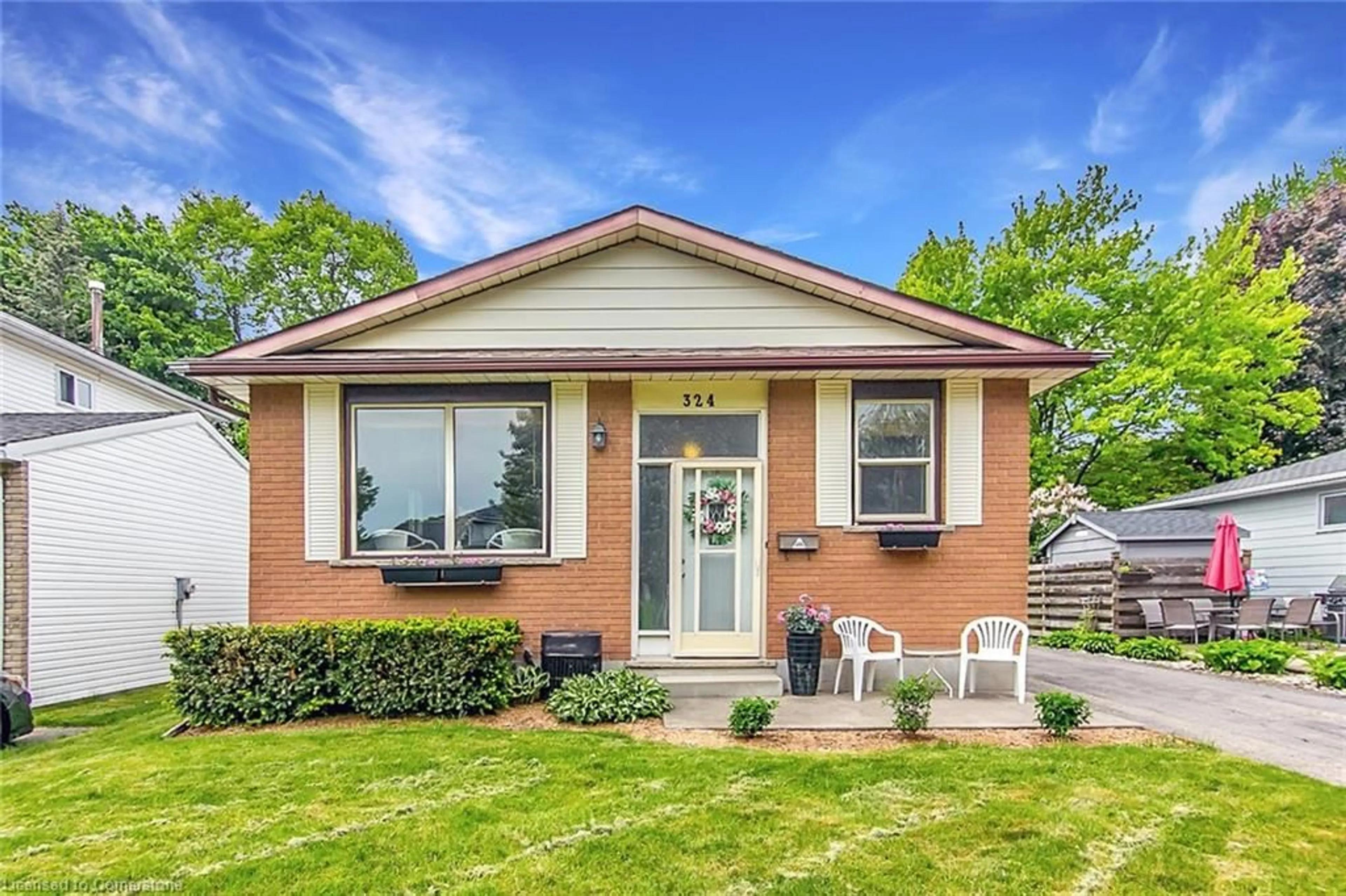 Home with brick exterior material, street for 324 Concordia Cres, Waterloo Ontario N2K 2M3