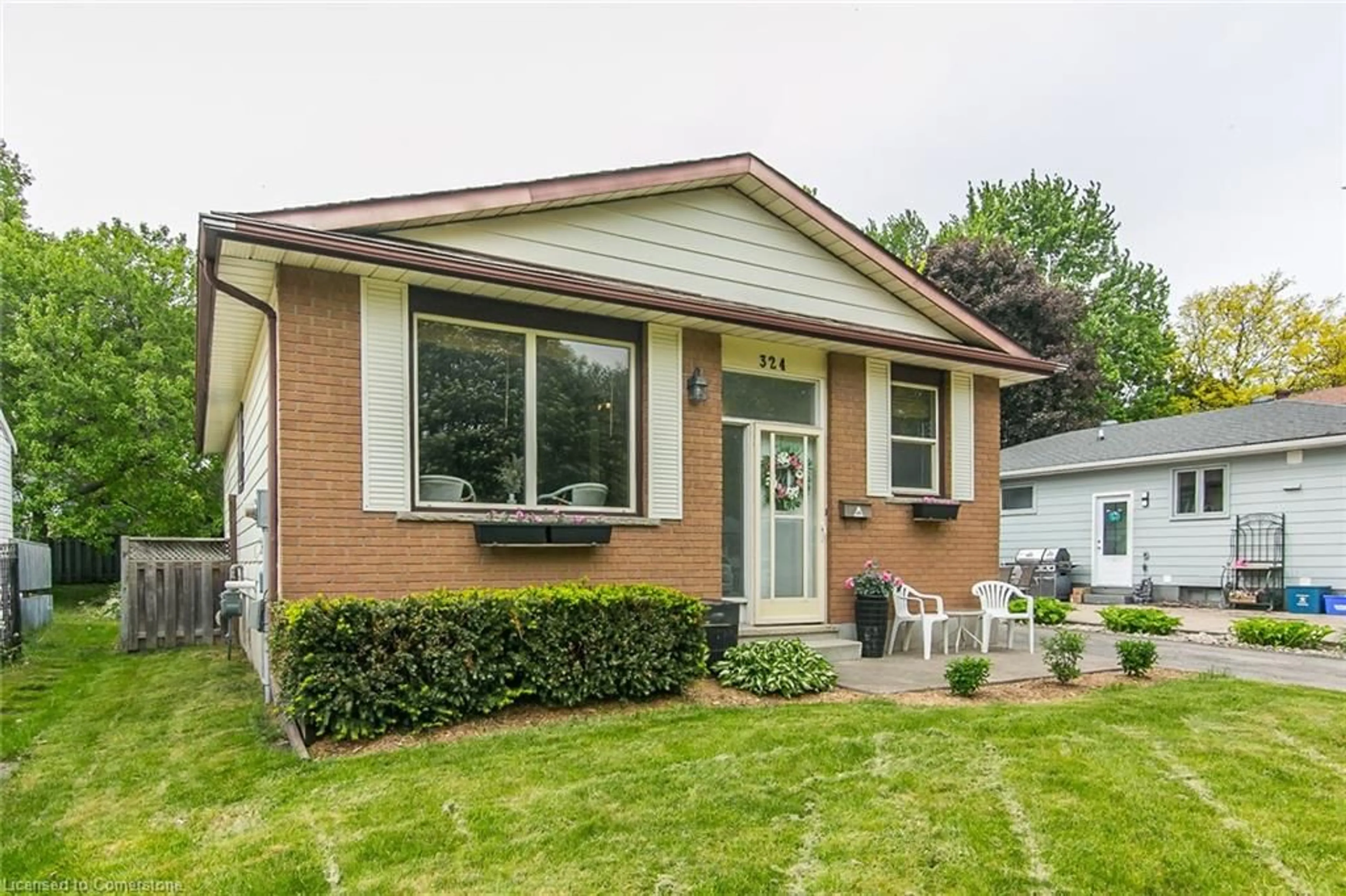 Home with brick exterior material, street for 324 Concordia Cres, Waterloo Ontario N2K 2M3