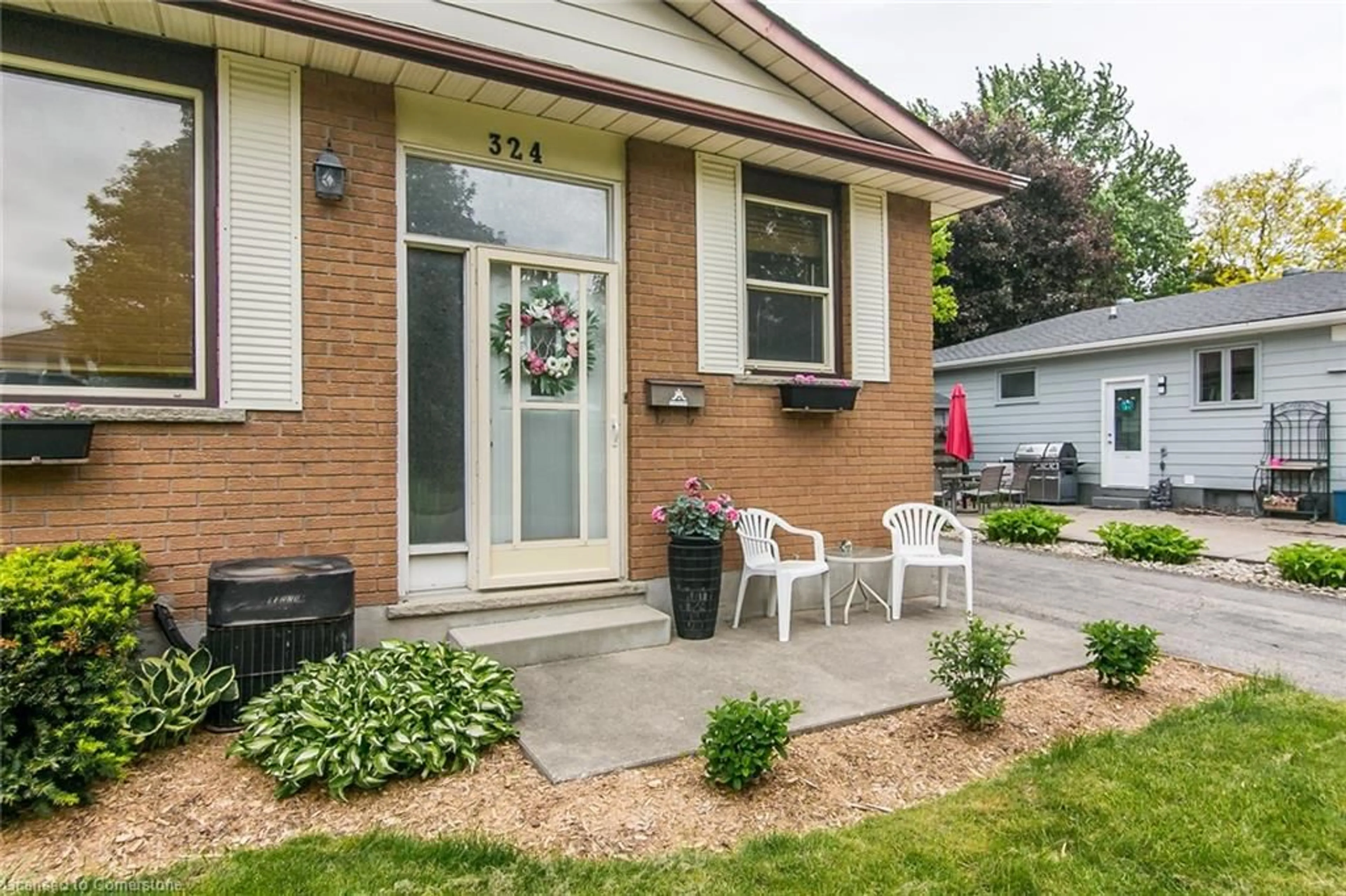 Home with brick exterior material, street for 324 Concordia Cres, Waterloo Ontario N2K 2M3