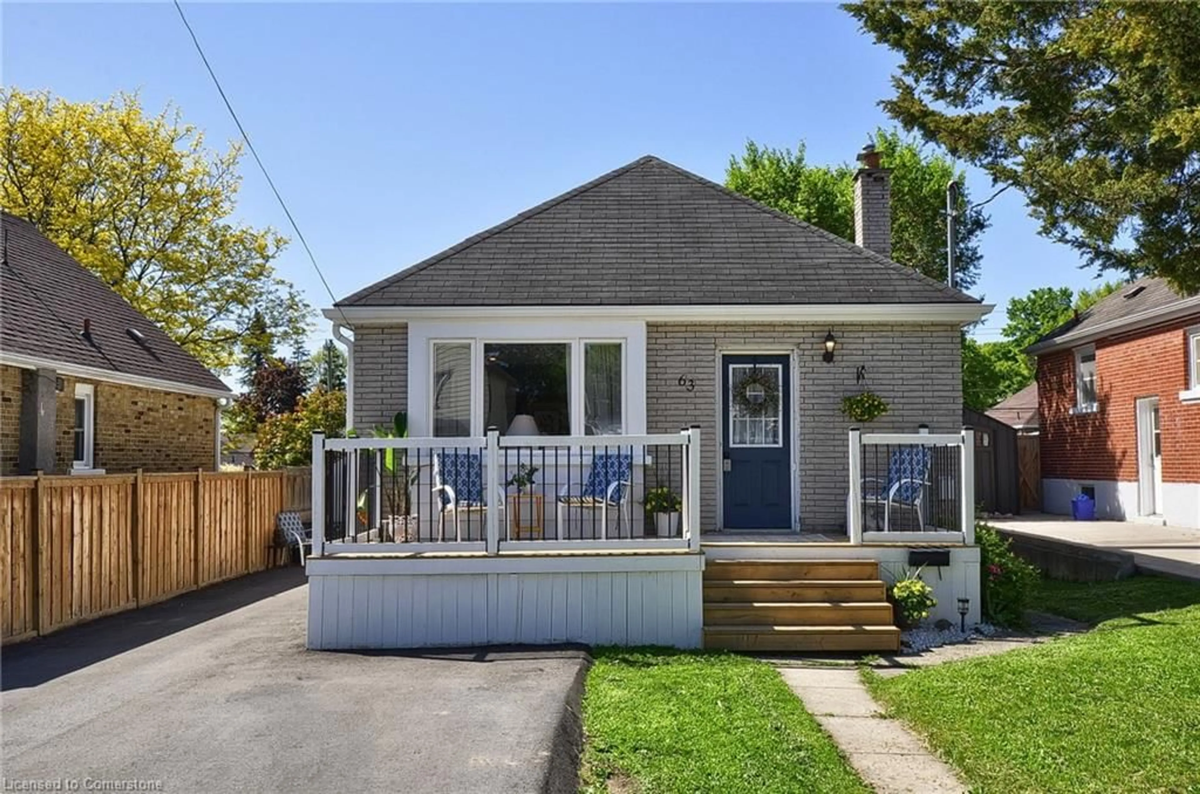 Home with vinyl exterior material, street for 63 Stanley St, Cambridge Ontario N1S 2A7
