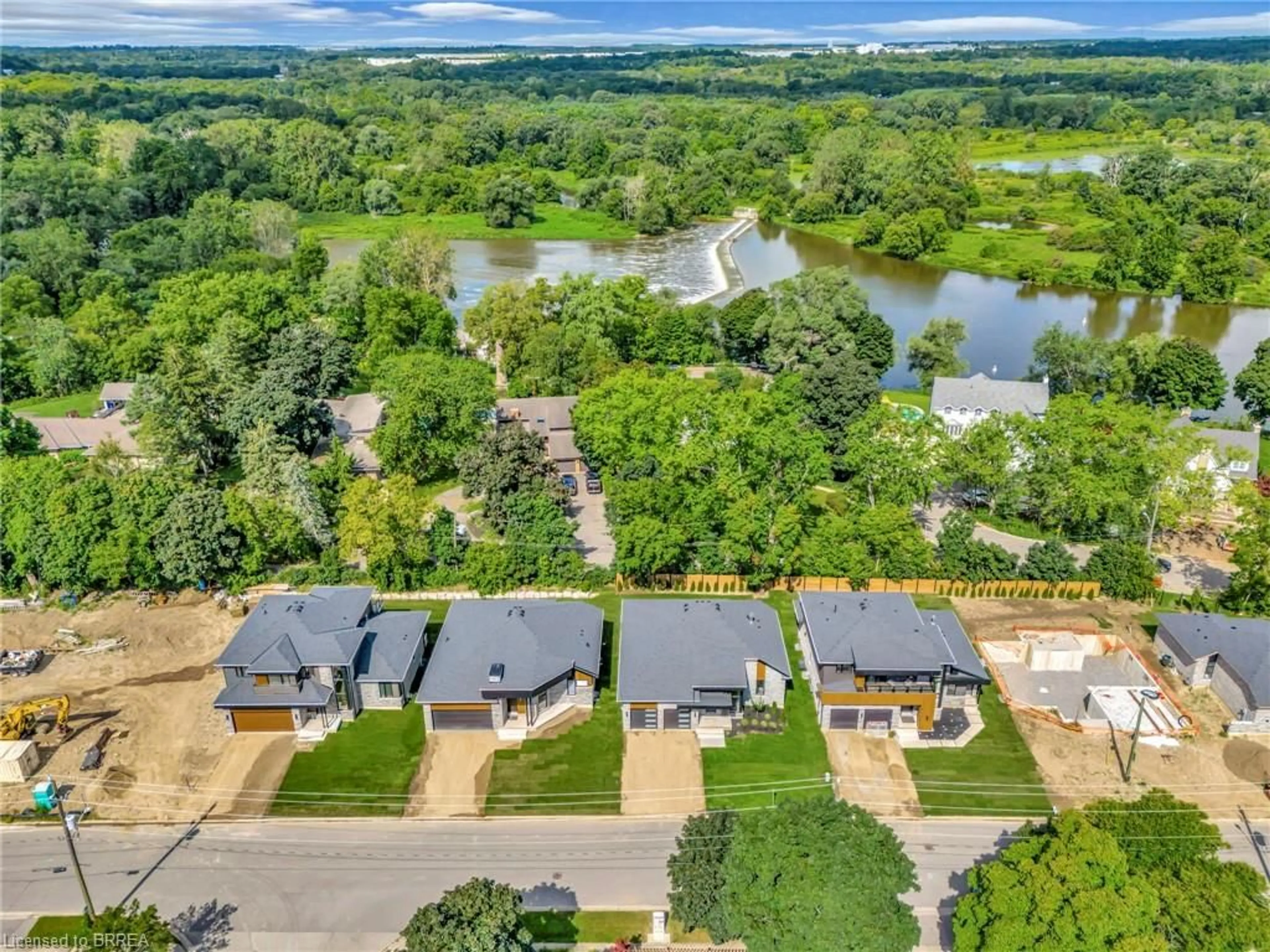 A pic from outside/outdoor area/front of a property/back of a property/a pic from drone, water/lake/river/ocean view for 161 Parkside Dr, Brantford Ontario N3T 0S9