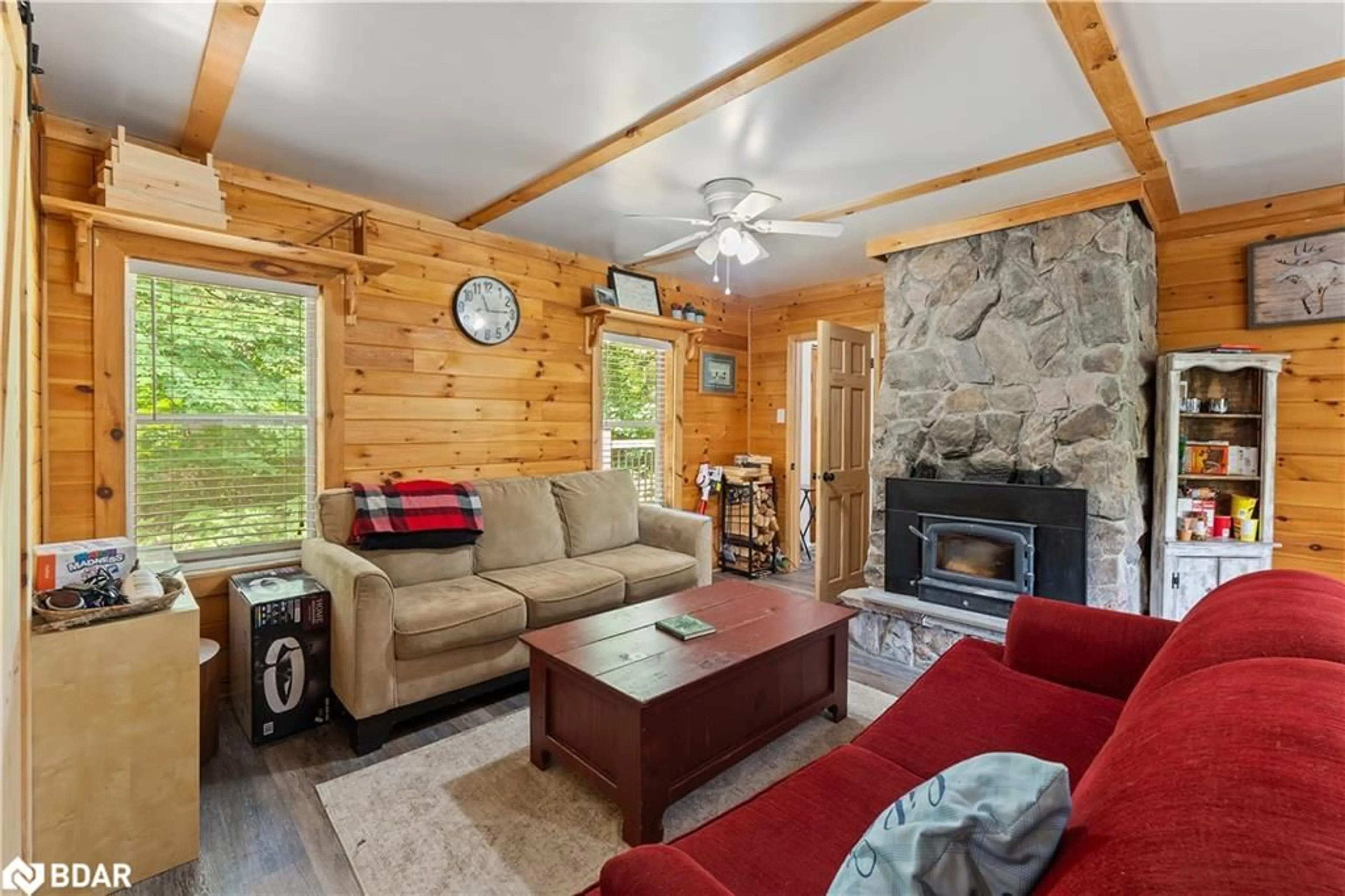 Living room with furniture, wood/laminate floor for 1370 Ranger Bay Rd, Loring Ontario P0H 1S0