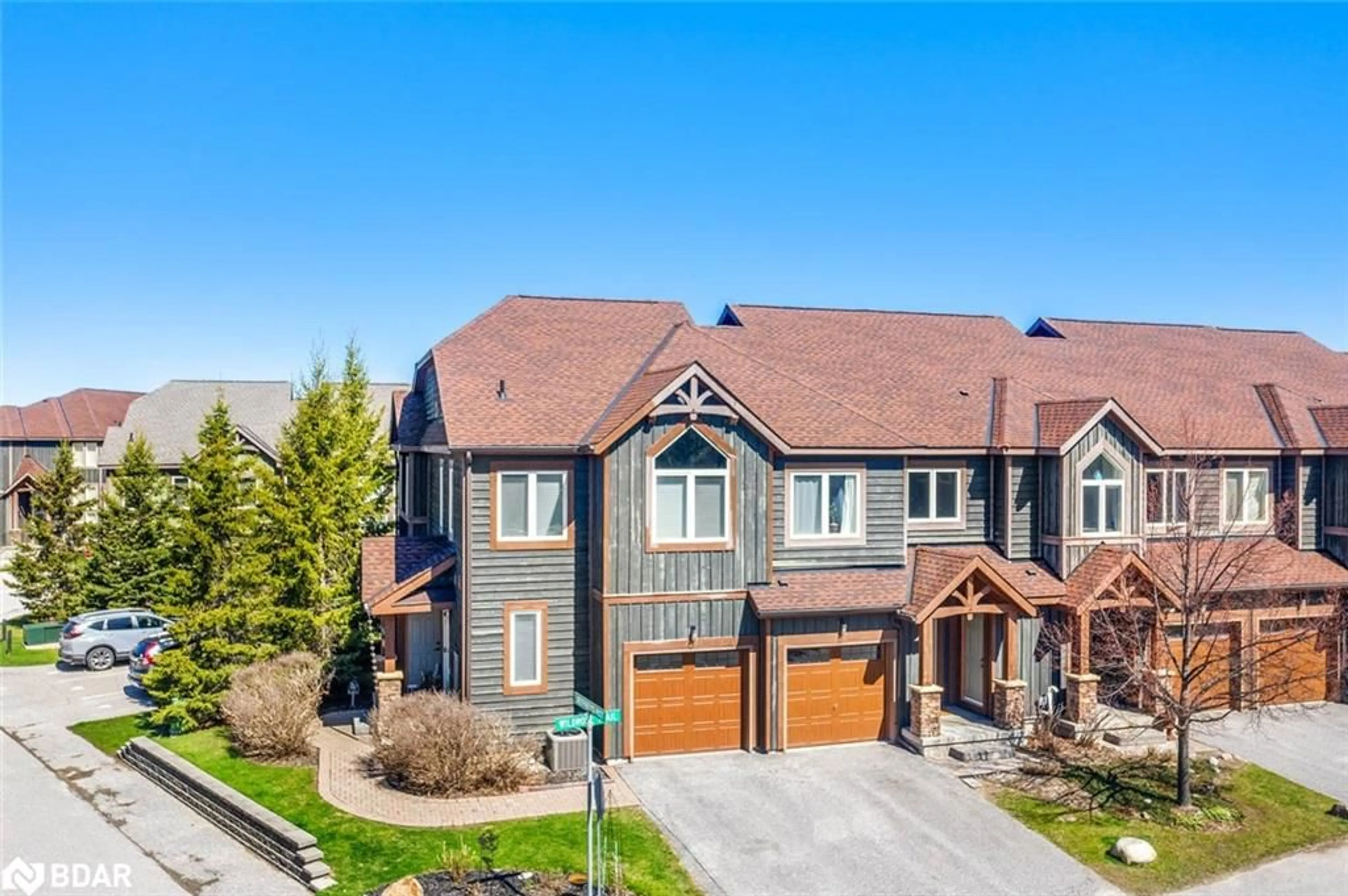 A pic from outside/outdoor area/front of a property/back of a property/a pic from drone, street for 20 Wildrose Trail #42, Collingwood Ontario L9Y 0J4