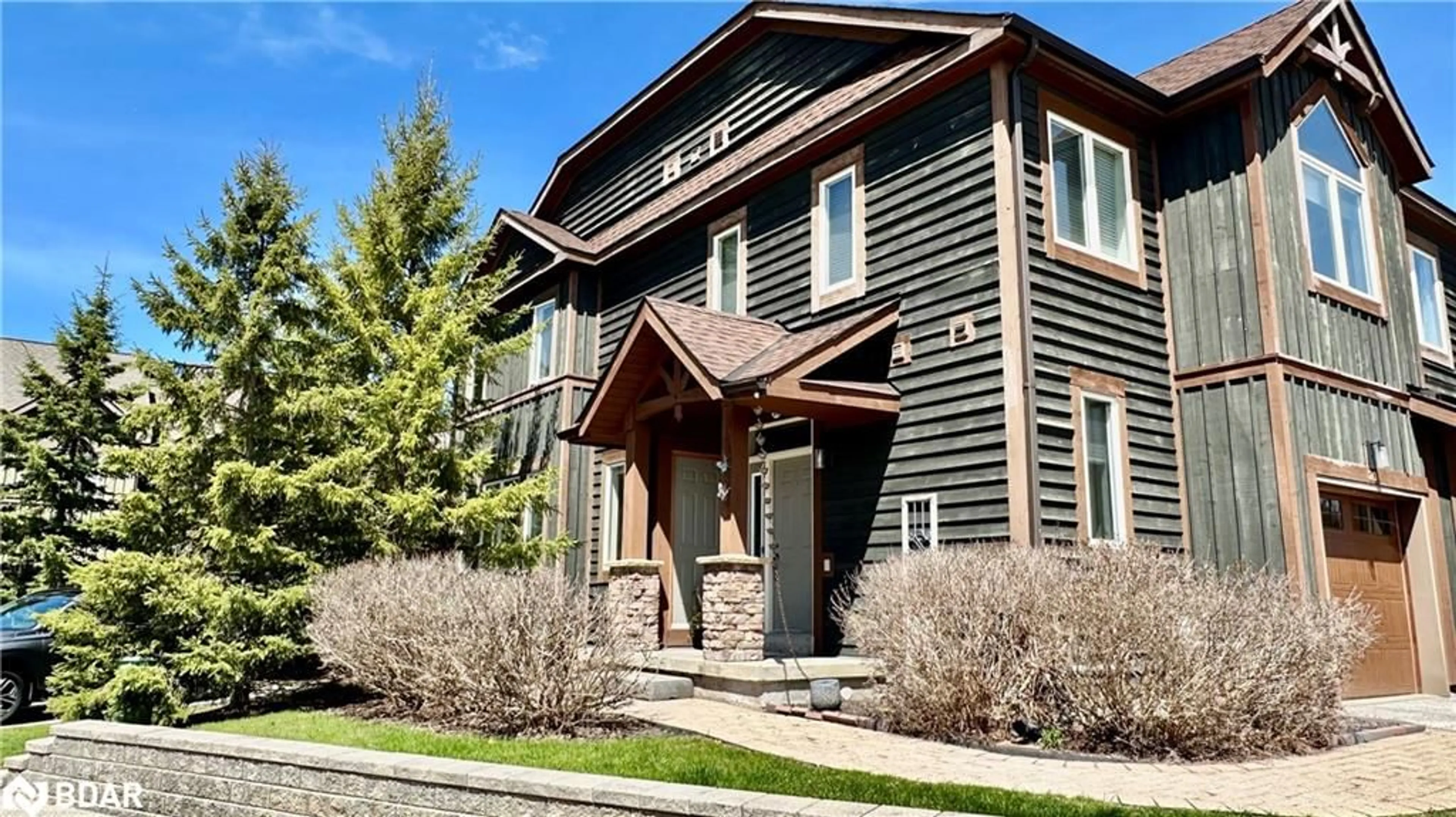 Home with brick exterior material, street for 20 Wildrose Trail #42, Collingwood Ontario L9Y 0J4