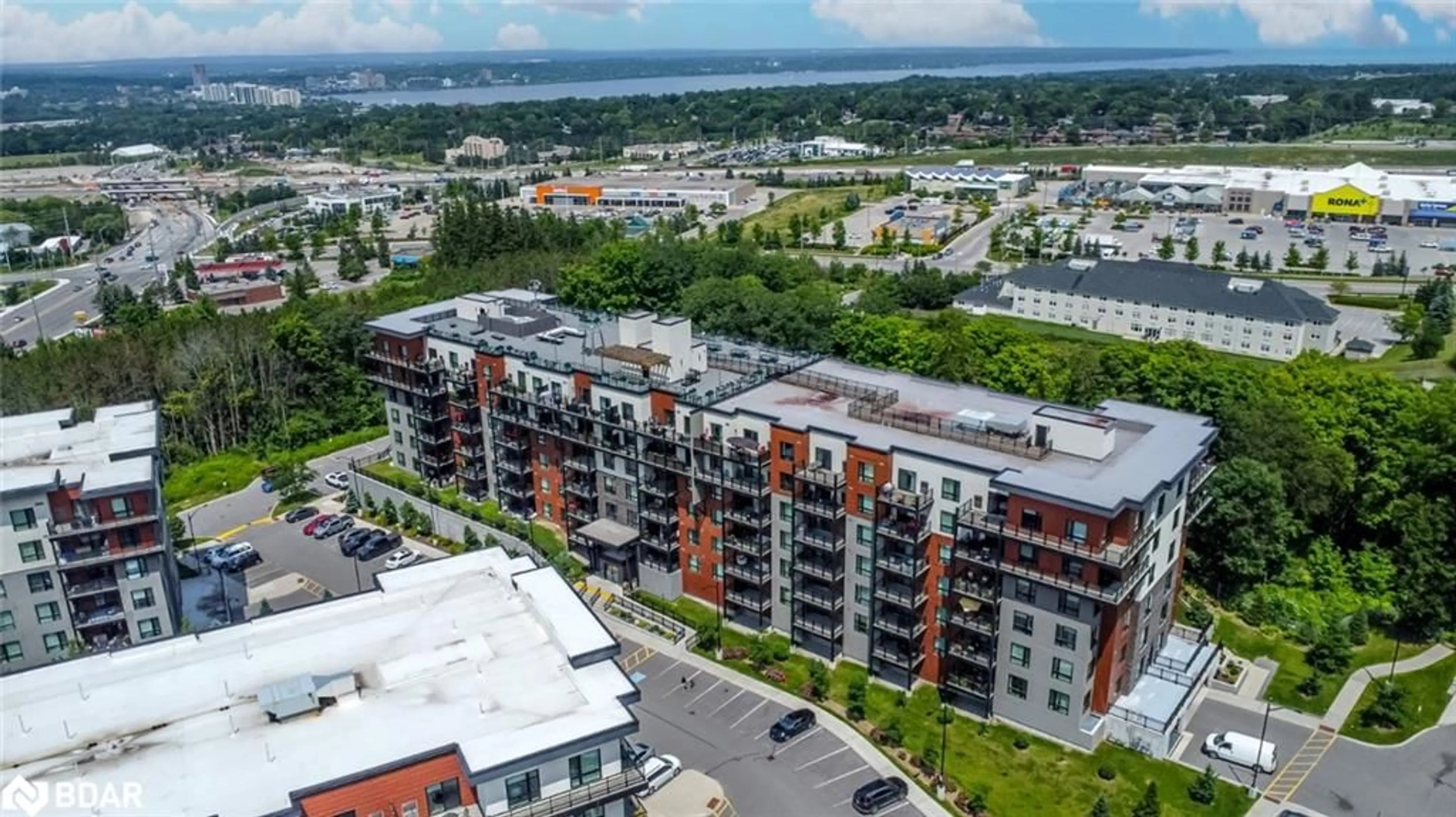 A pic from outside/outdoor area/front of a property/back of a property/a pic from drone, city buildings view from balcony for 302 Essa Road Rd #309, Barrie Ontario L9J 0H3