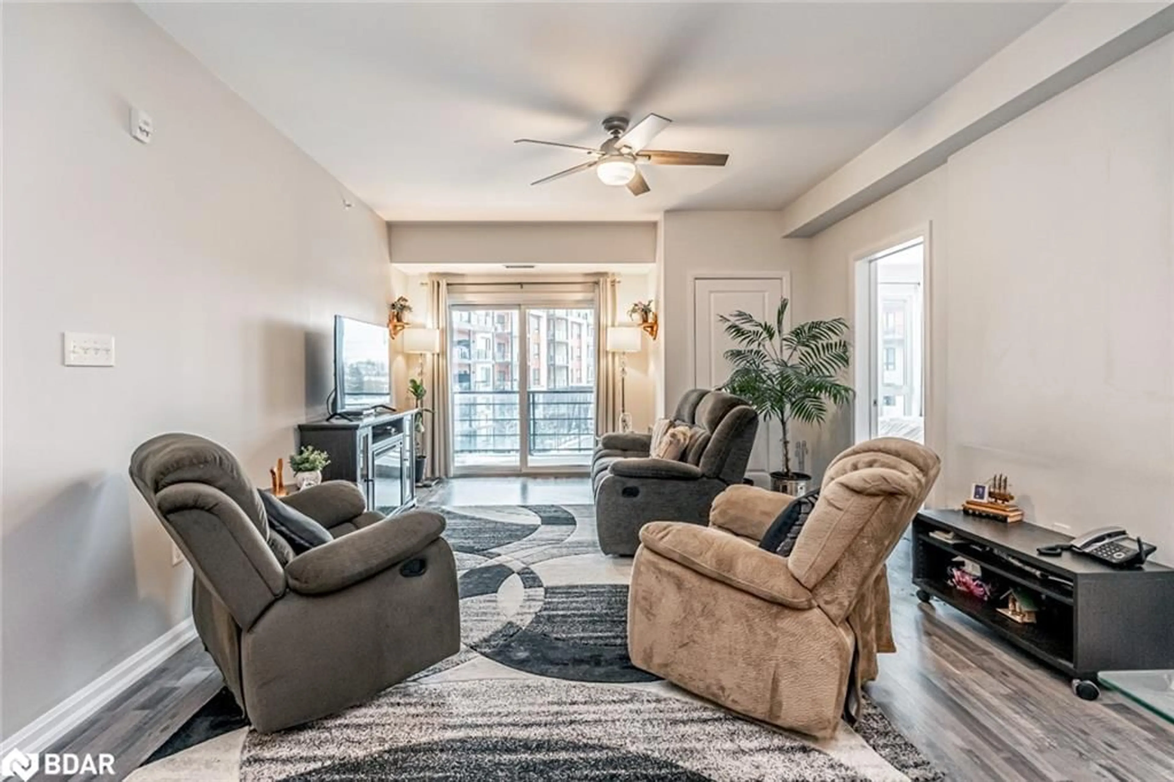 Living room with furniture, unknown for 302 Essa Road Rd #309, Barrie Ontario L9J 0H3