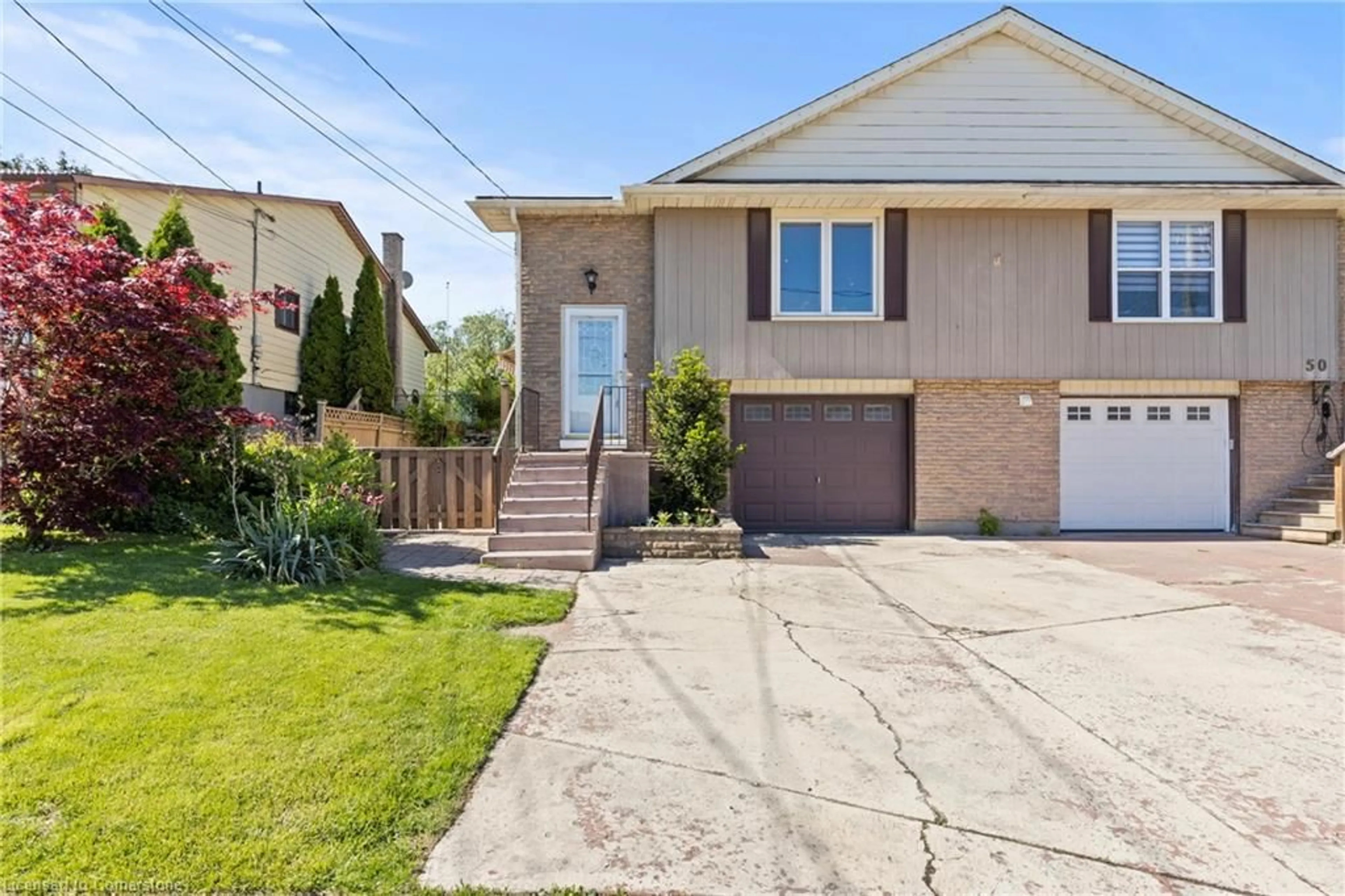 Home with vinyl exterior material, street for 52 Burke St, Caledonia Ontario N3W 1C4
