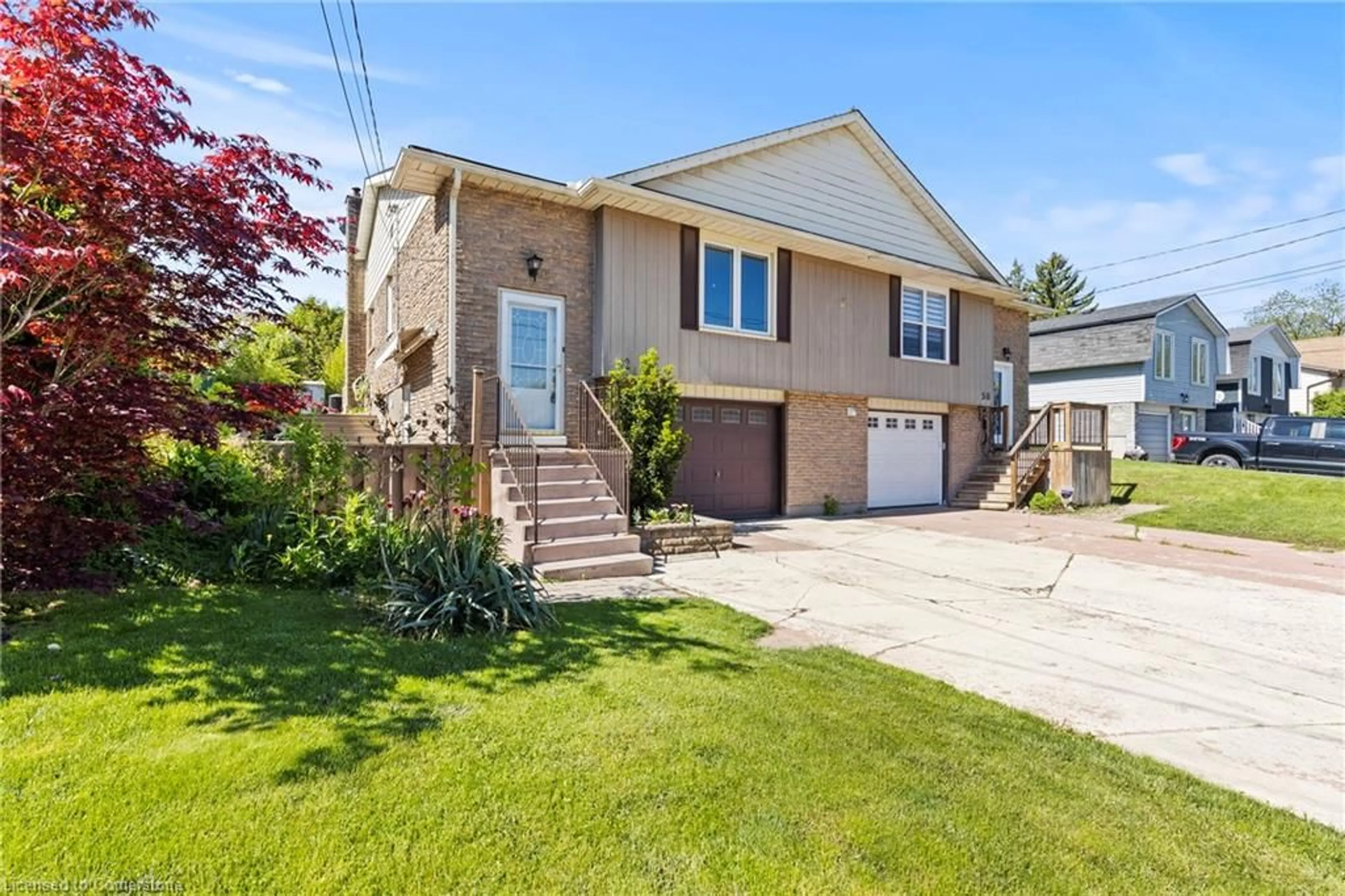 Home with vinyl exterior material, street for 52 Burke St, Caledonia Ontario N3W 1C4
