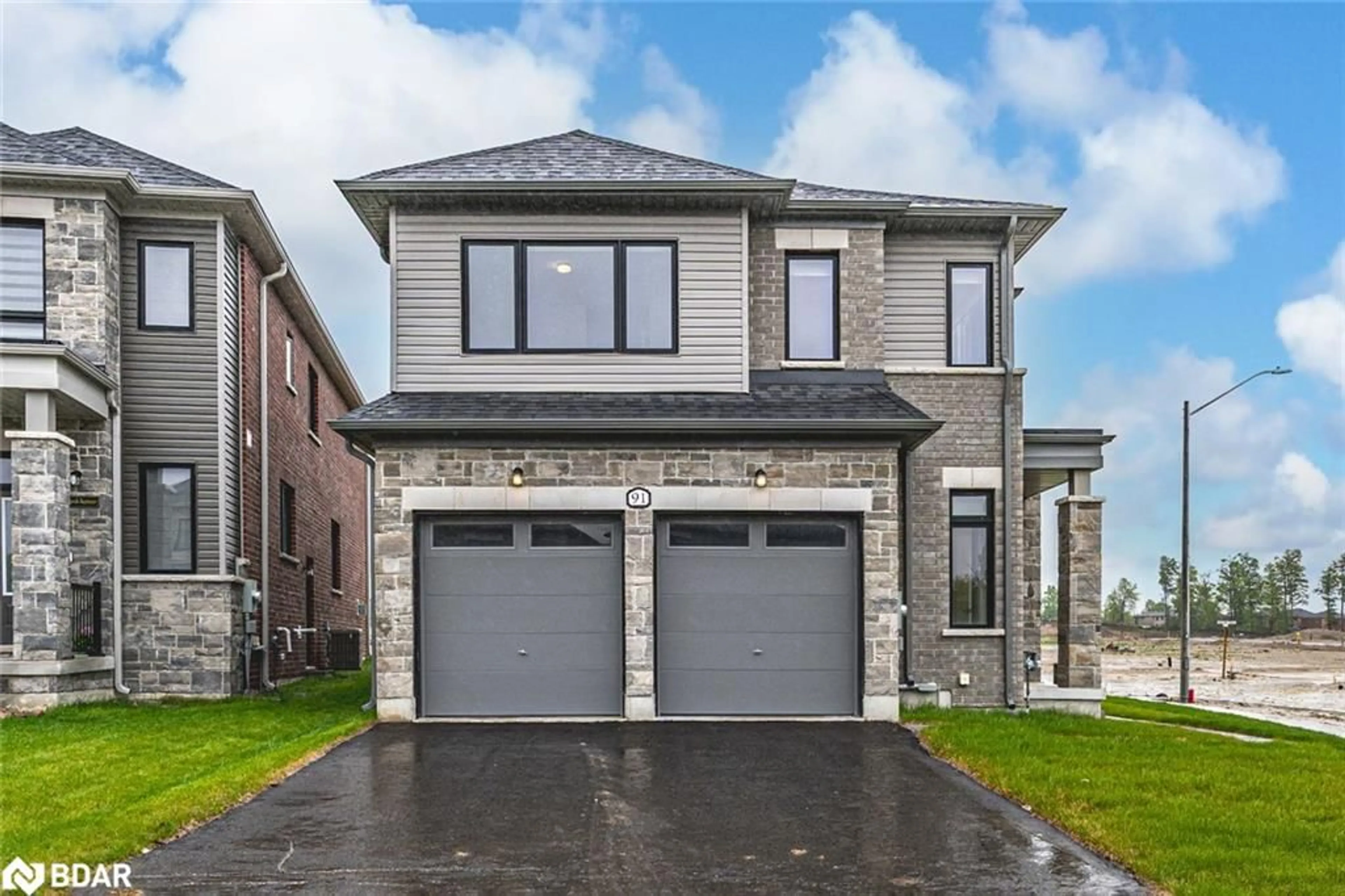 Home with brick exterior material, street for 91 Thicketwood Ave, Barrie Ontario L9J 0W8