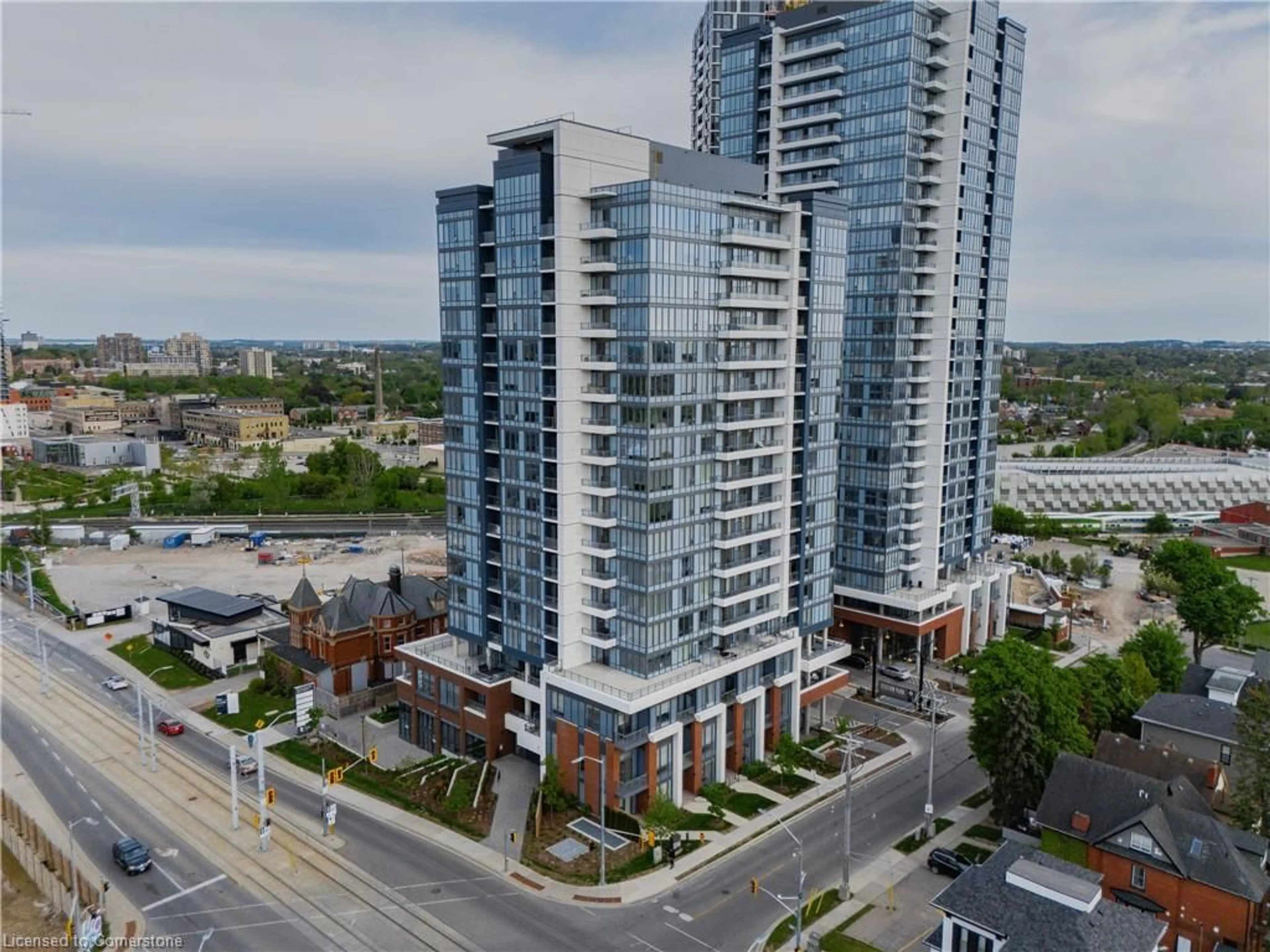 A pic from outside/outdoor area/front of a property/back of a property/a pic from drone, city buildings view from balcony for 5 Wellington St #414, Kitchener Ontario N2G 0E3